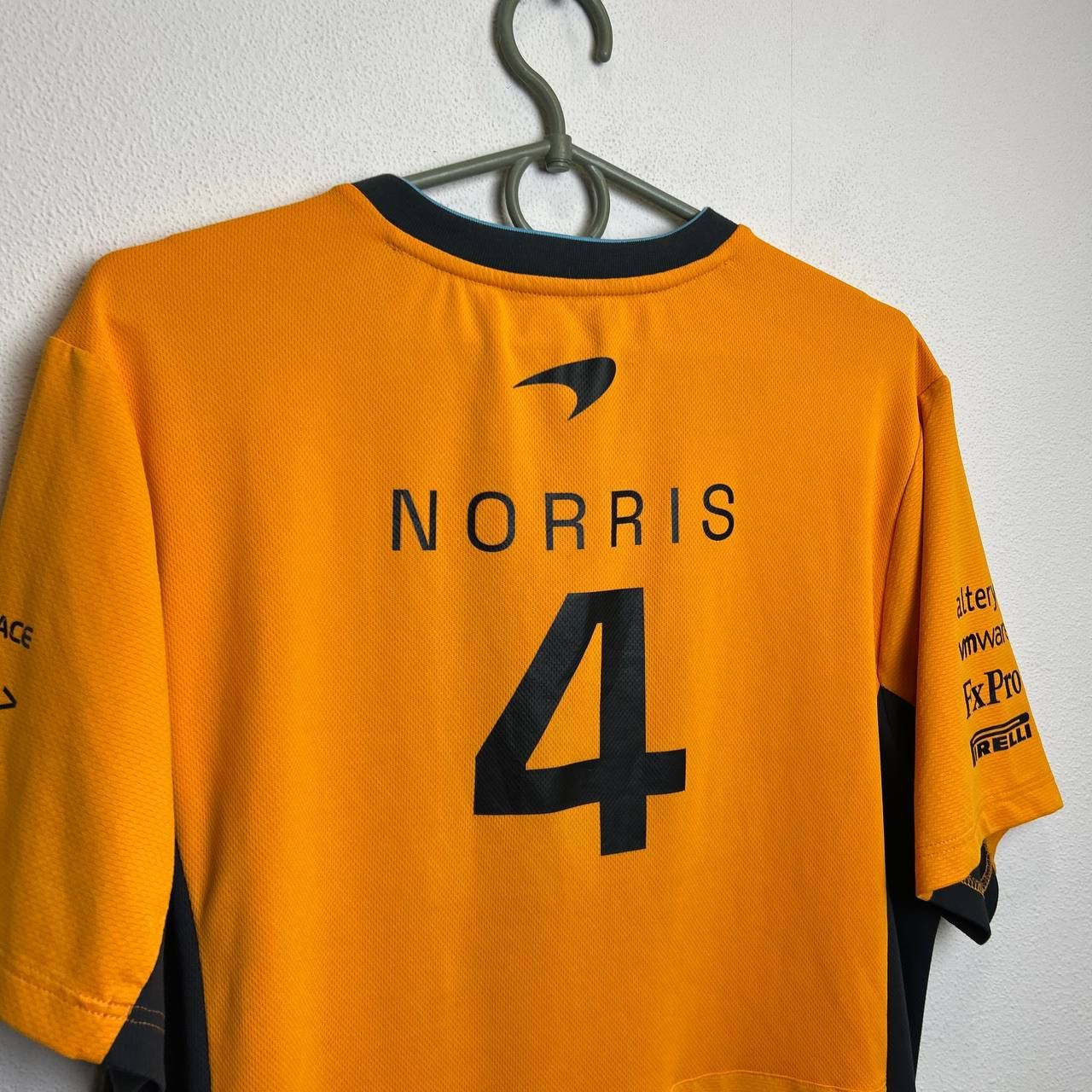 Castore Mens Castore McLaren 4 Norris Racing nascar tee Size US M / EU 48-50 / 2 - 14 Thumbnail