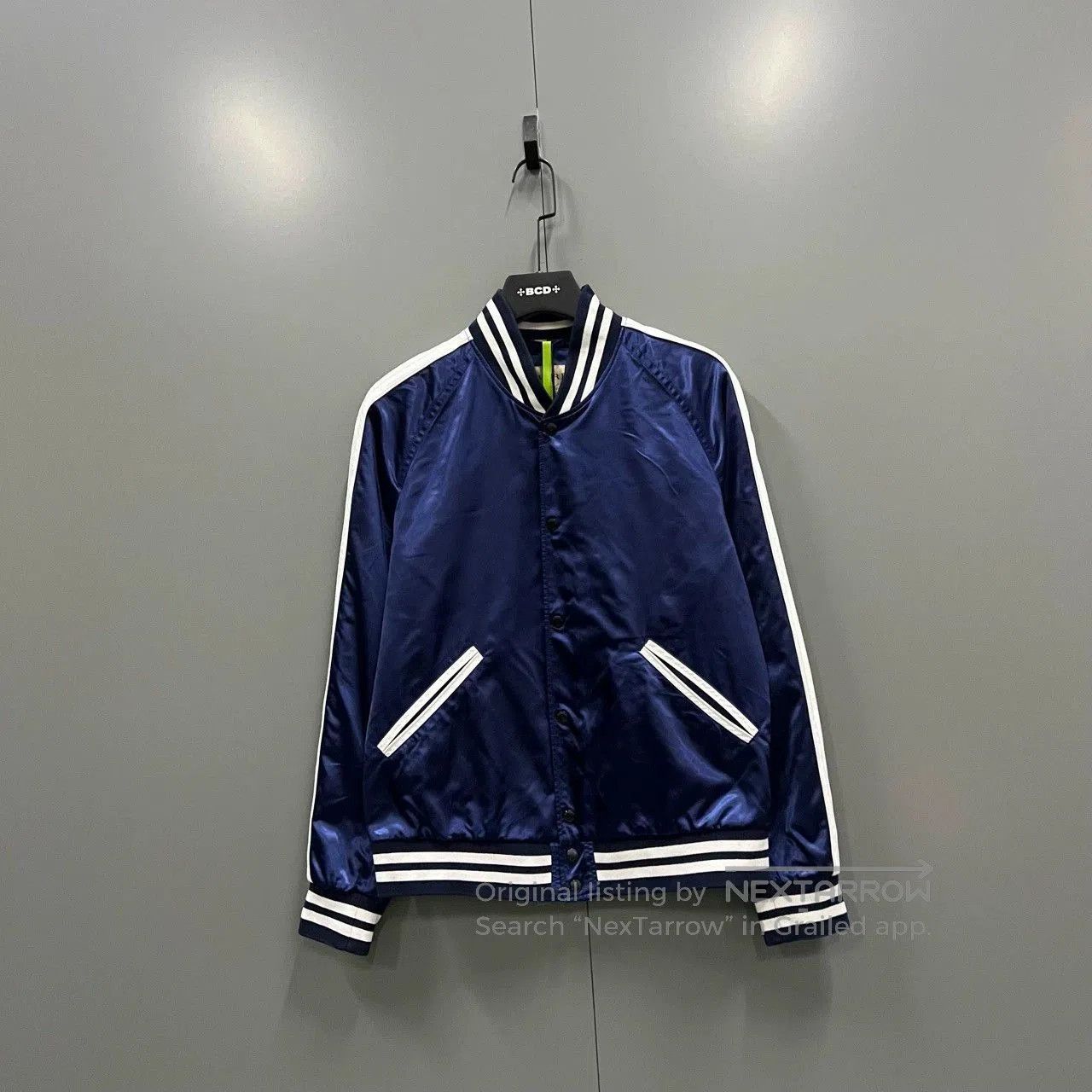 blue silk long sleeve jacket by burberry.