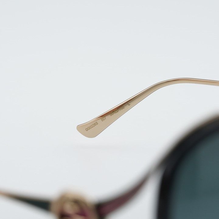 Gucci Gucci GG0226S 007 Sunglasses Shiny Black Round Frame, Grey Size ONE SIZE - 8 Thumbnail