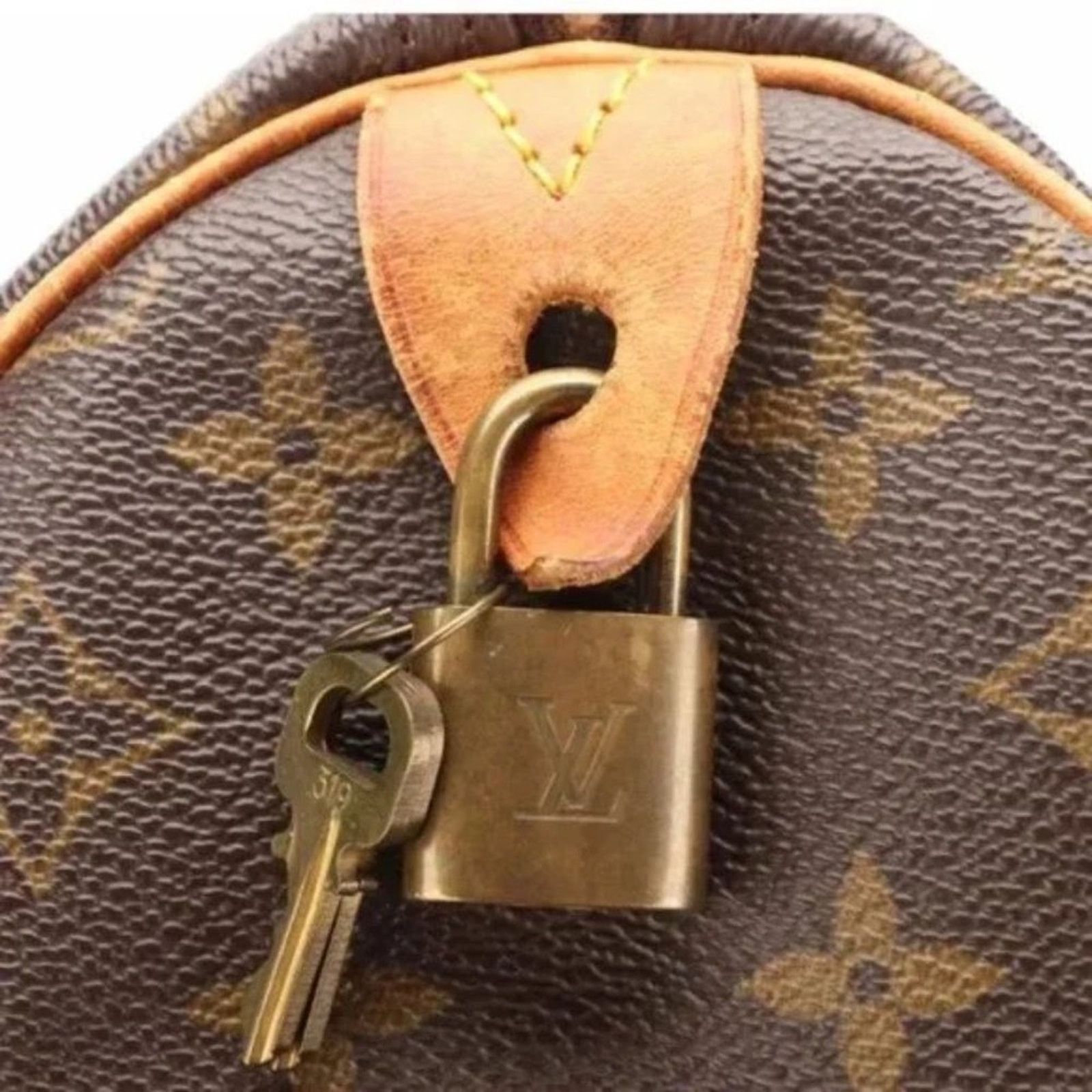 Louis Vuitton LOUIS VUITTON Iconic Speedy 35 Handbag in Monogram Canvas Size ONE SIZE - 7 Thumbnail
