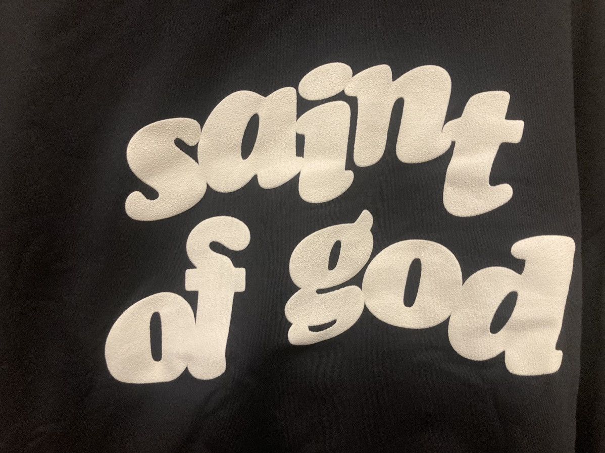 SAINT MICHAEL × FEAR OF GOD SAINT Mxxxxxx × FEAR OF GOD SS25 FG_HOODIE/SNT OF GOD / BLK