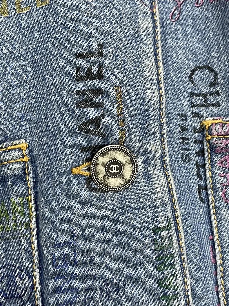 Chanel Logo denim jacket with graffiti