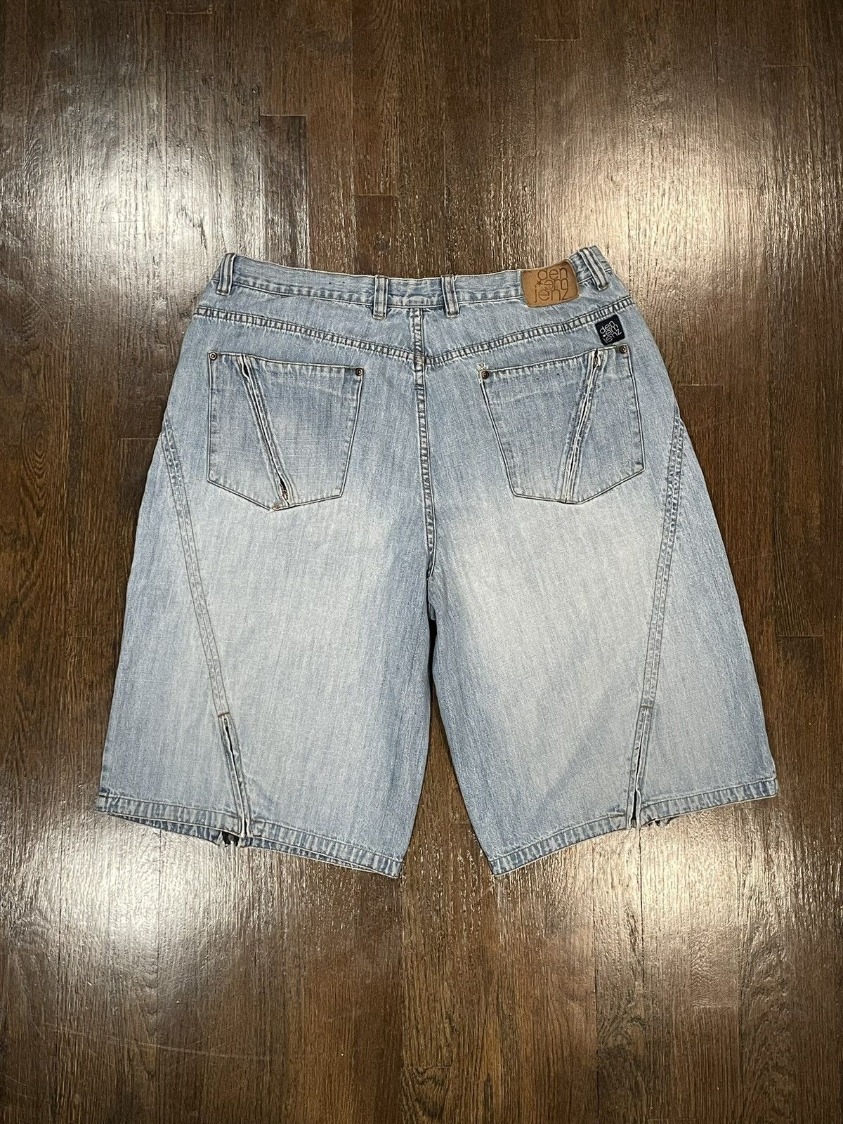 Distressed denim shorts with faded details