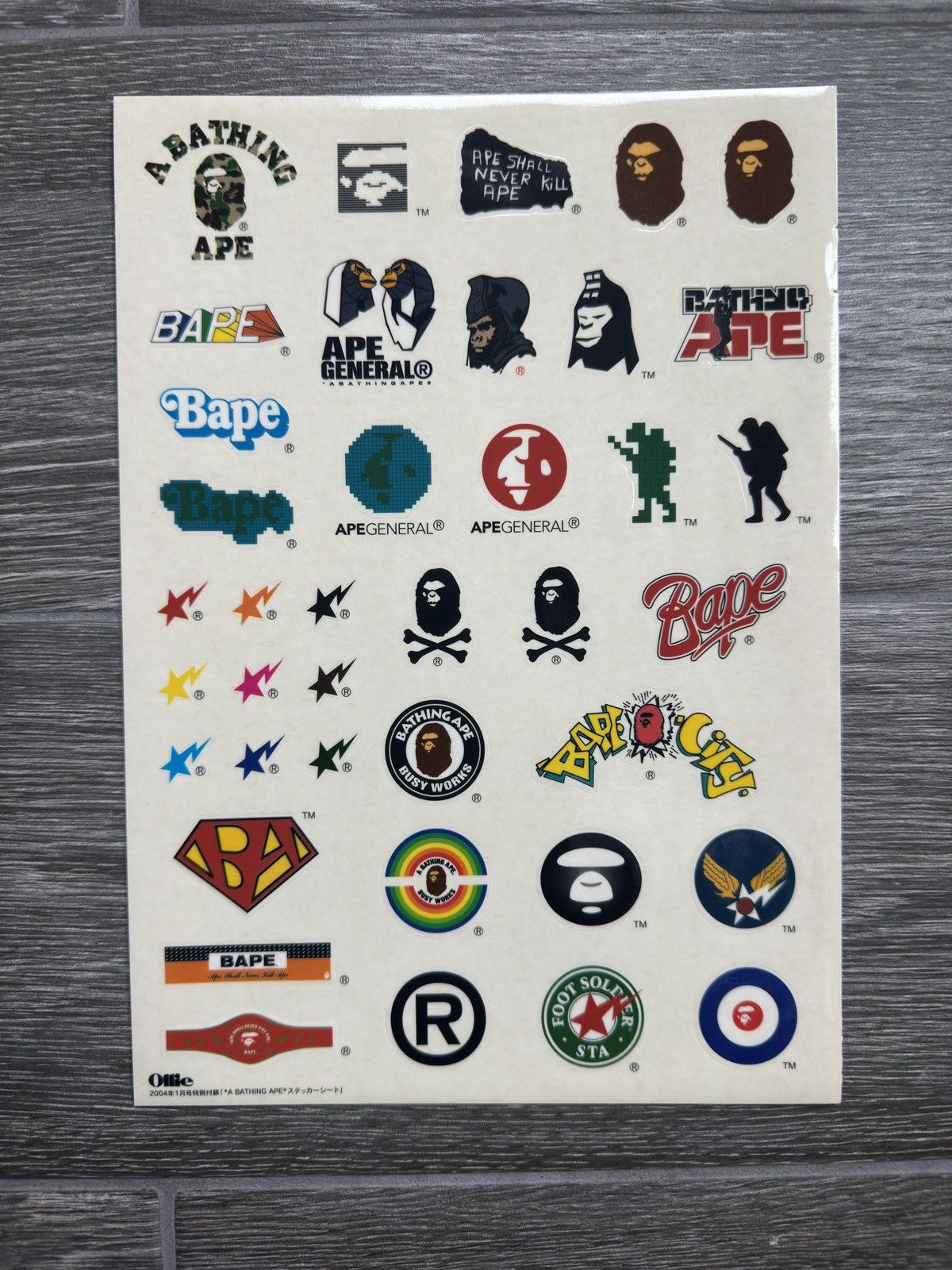 Bape × Kaws Bape x Kaws Logo Sticker Sheet Camo | Grailed