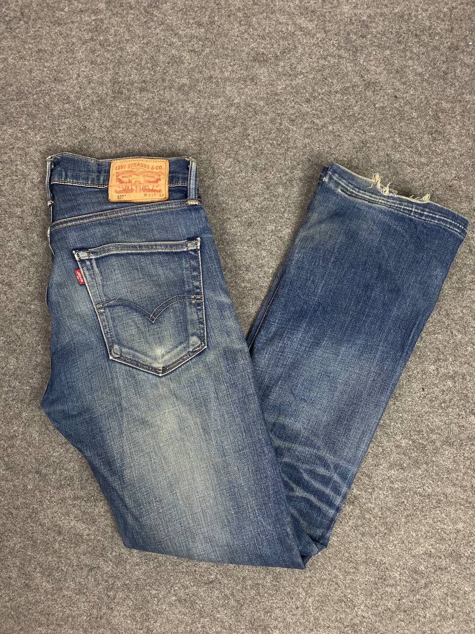 levis 527 bootcut flare distressed denim