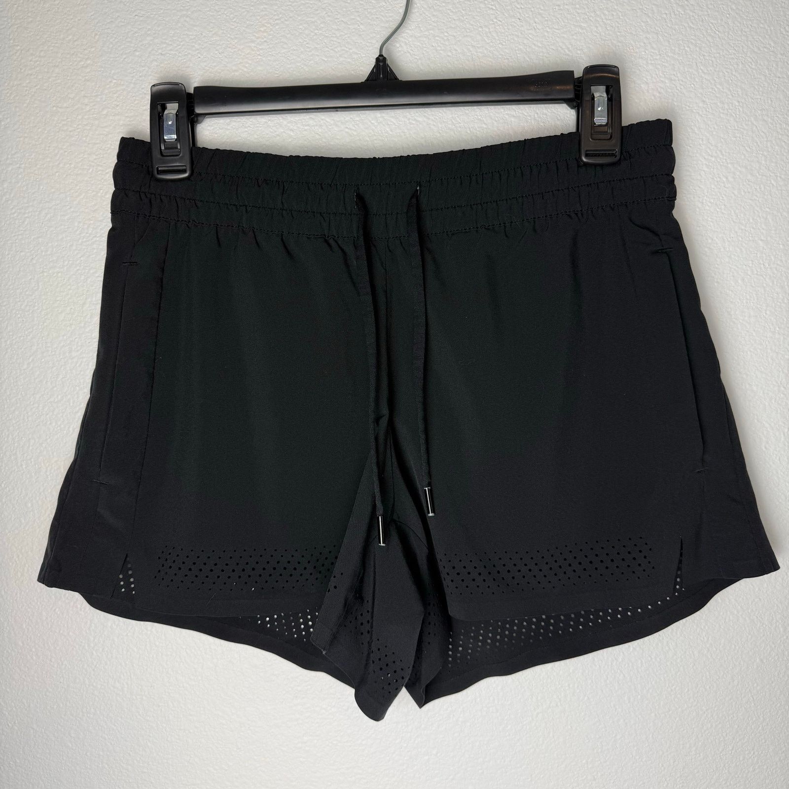 Athleta Athletha Black Shorts, Sz Med with cutout design Size 30" / US 8 / IT 44 - 1 Thumbnail
