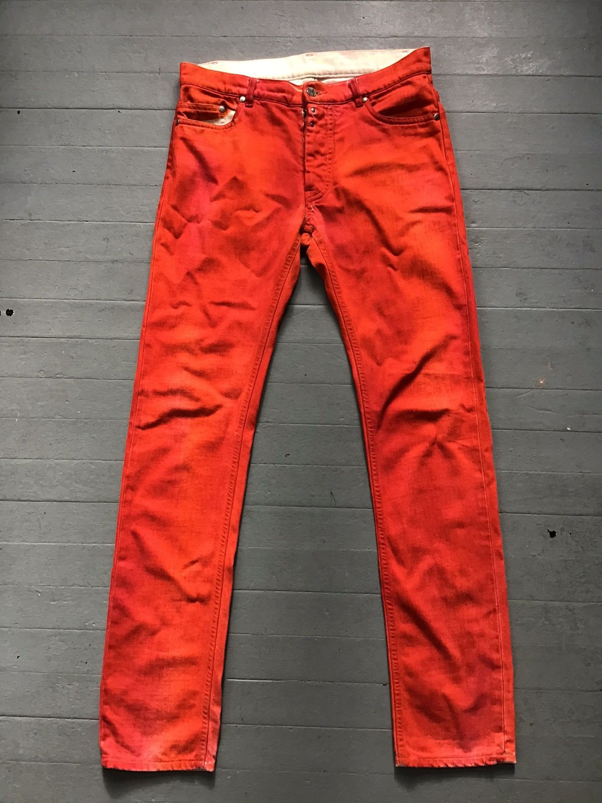 image of Maison Margiela Dye Painted Jeans Slim Fit in Red, Men's (Size 30)