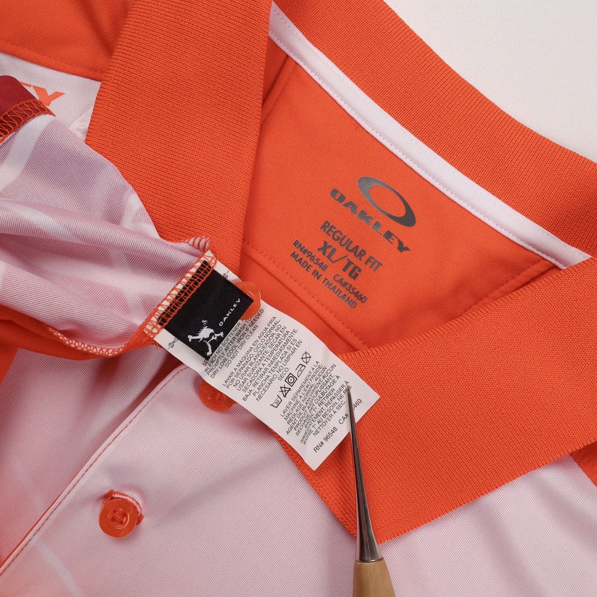 Oakley NEW Men’s Oakley Slide Polo Shirts Red Orange Size: XL Size US XL / EU 56 / 4 - 14 Thumbnail