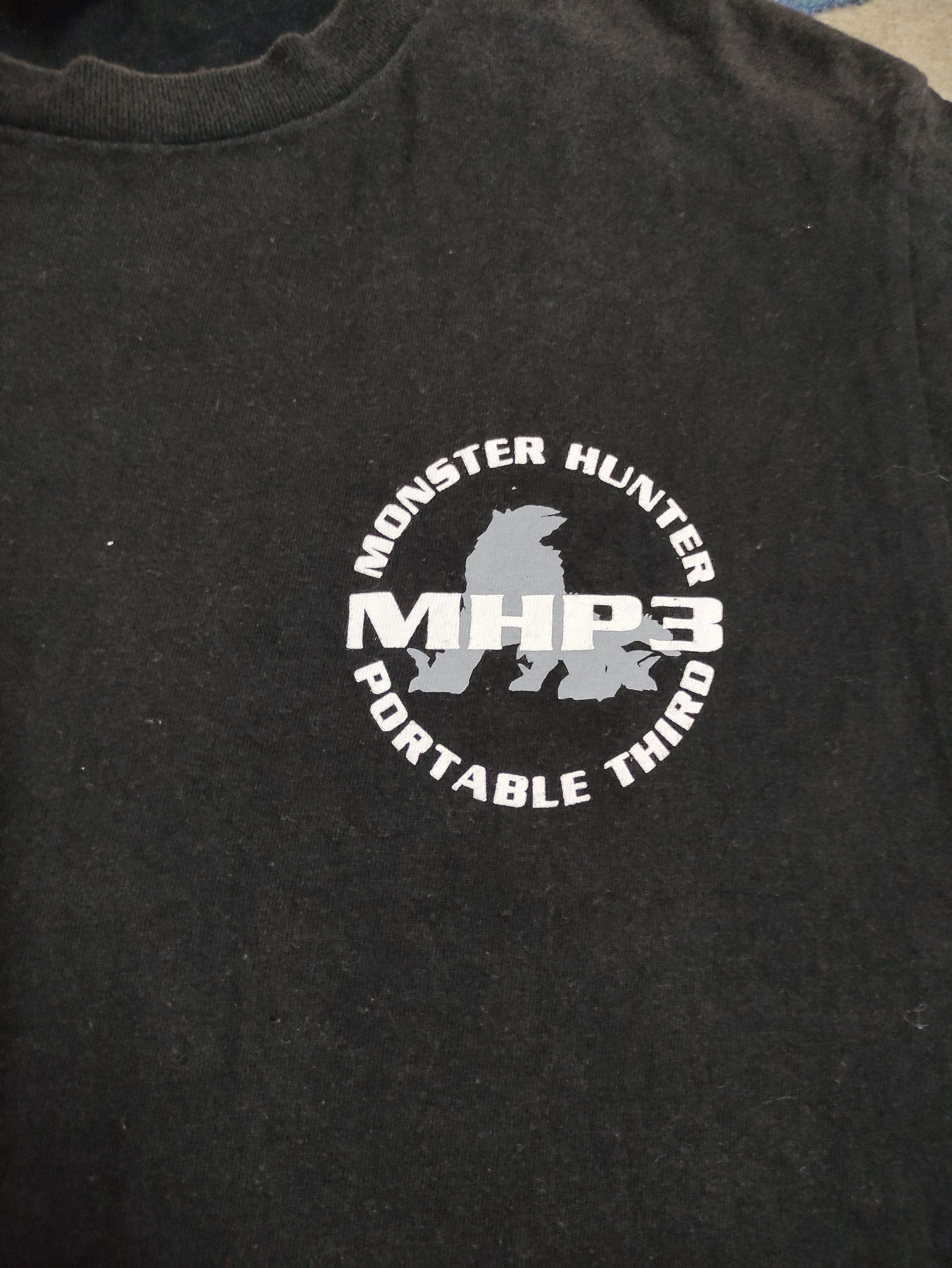 Playstation VINTAGE MONSTER HUNTER PORTABLE 3rd PLAYSTATION PROMO TEE Size US L / EU 52-54 / 3 - 4 Thumbnail