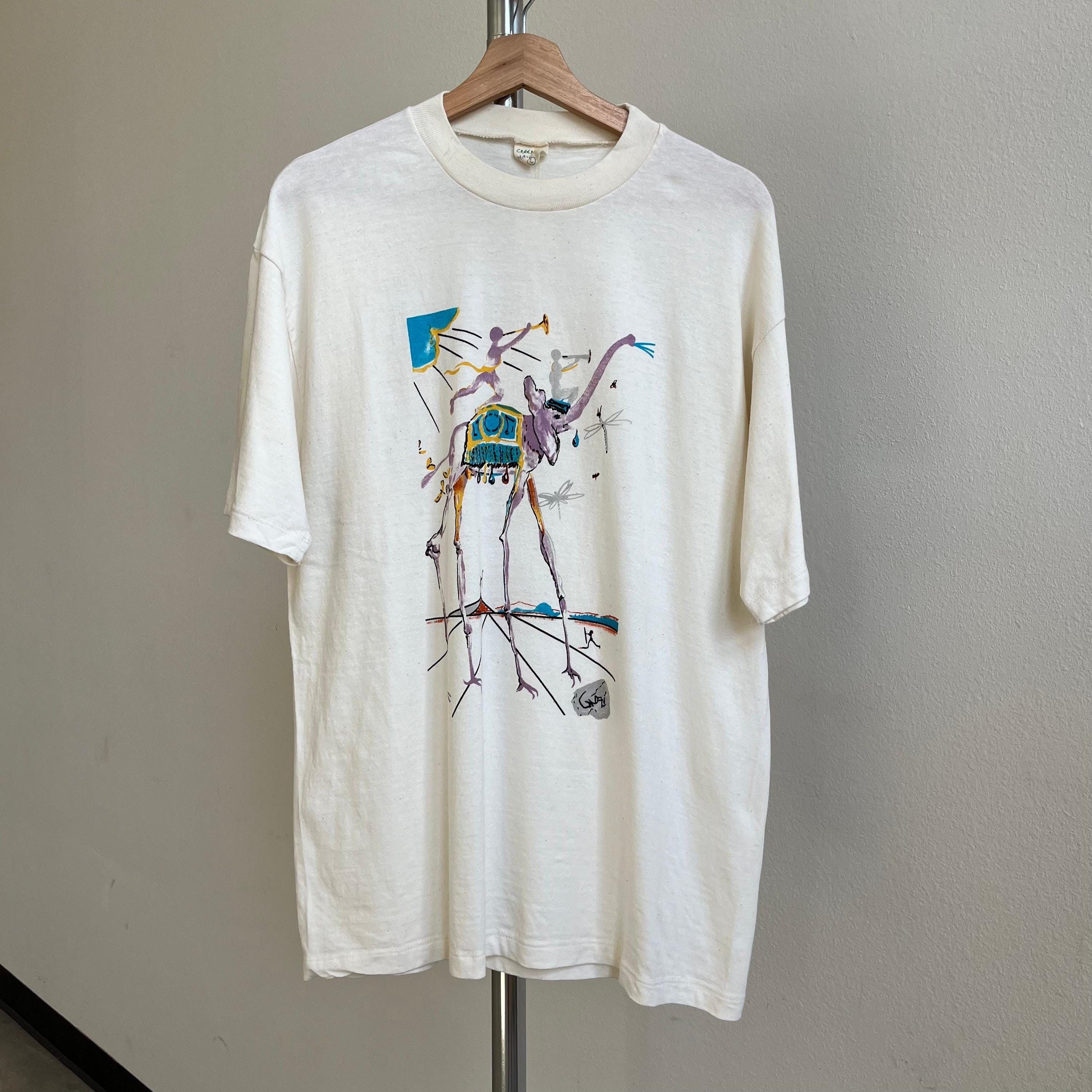 Vintage 90's Vintage Salvador Dali Elephant Artwork Graphic T-Shirt Size US L / EU 52-54 / 3 - 1 Thumbnail