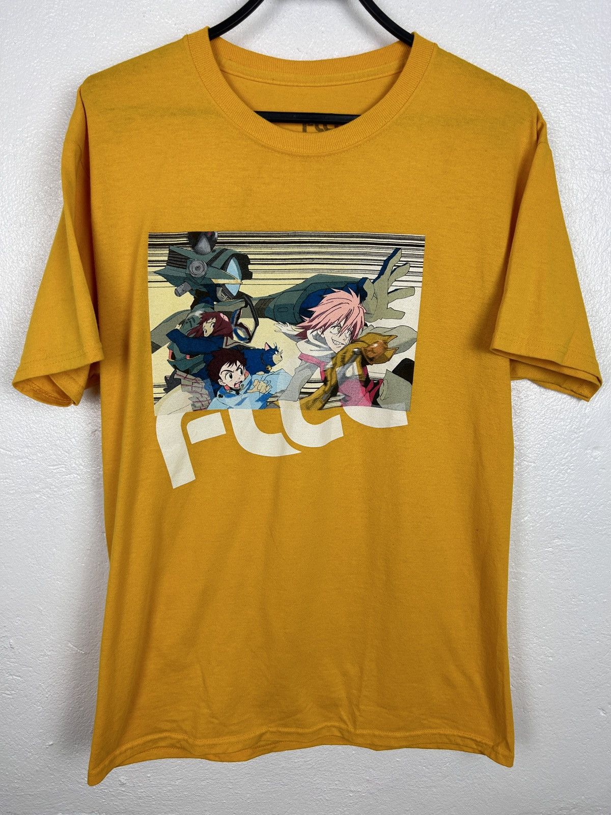 Anima Furi Kuri FLCL OVA Anime Series T-Shirt In Yellow | Grailed