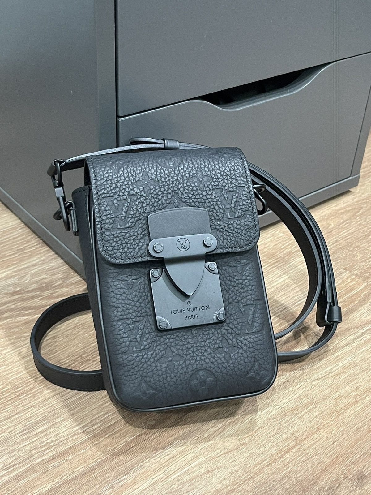 image of Louis Vuitton S-Lock Vertical Wearable Wallet/bag in Black, Men's
