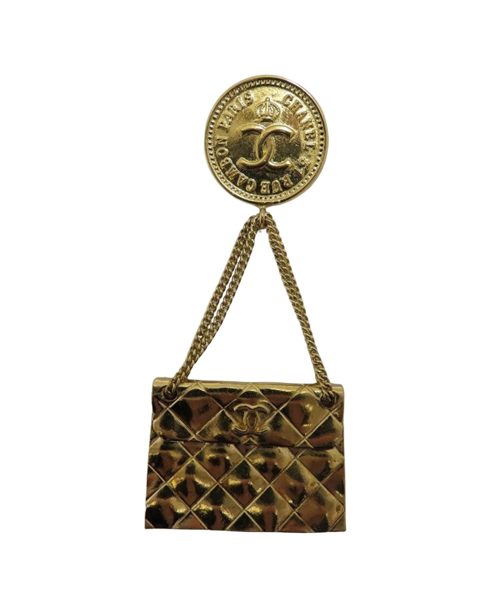 image of Chanel Gold-Toned Metal Brooch With Elegant Design, Women's
