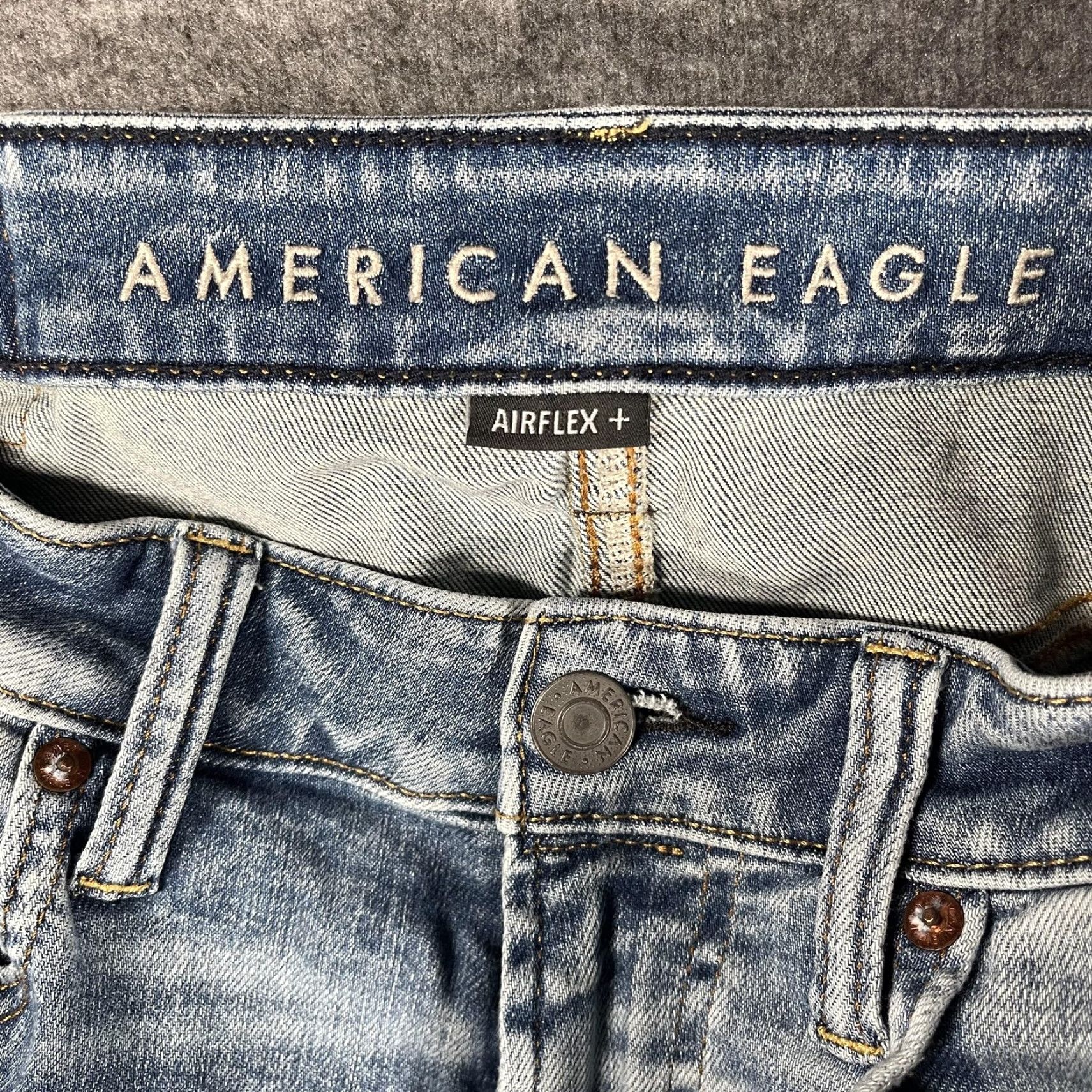 American Eagle Outfitters American Eagle Jeans Mens 32x34 Light Wash AirFlex+ Move-Free Skinny Distressed Jeans Mens Regular 32x34 Blue 5-Pocket Distressed Comfortable Size US 32 / EU 48 - 5 Thumbnail