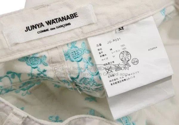 white vintage embroidered flower pants.