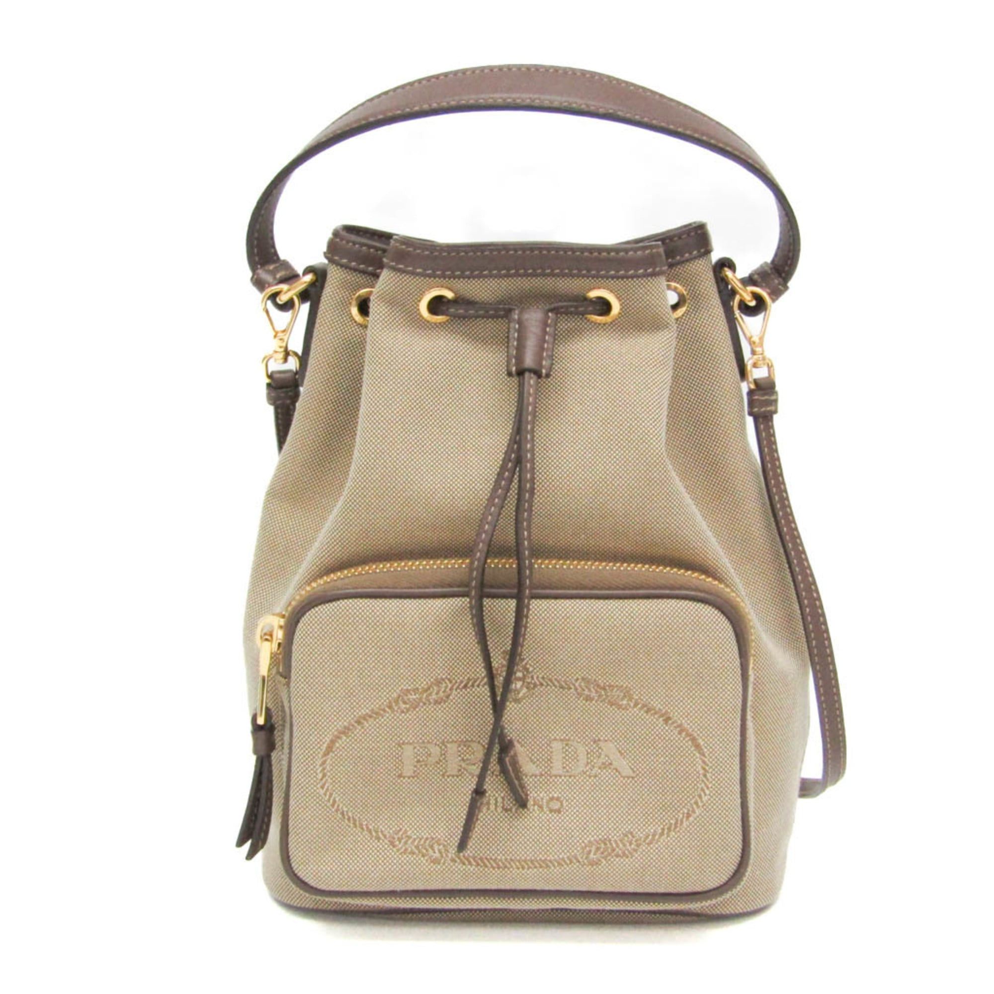 Prada Prada Logo Jacquard Drawstring Bag Women's Leather,Jacquard Handbag,Shoulder Bag Beige Brown,Dark Brown Size ONE SIZE - 1 Thumbnail