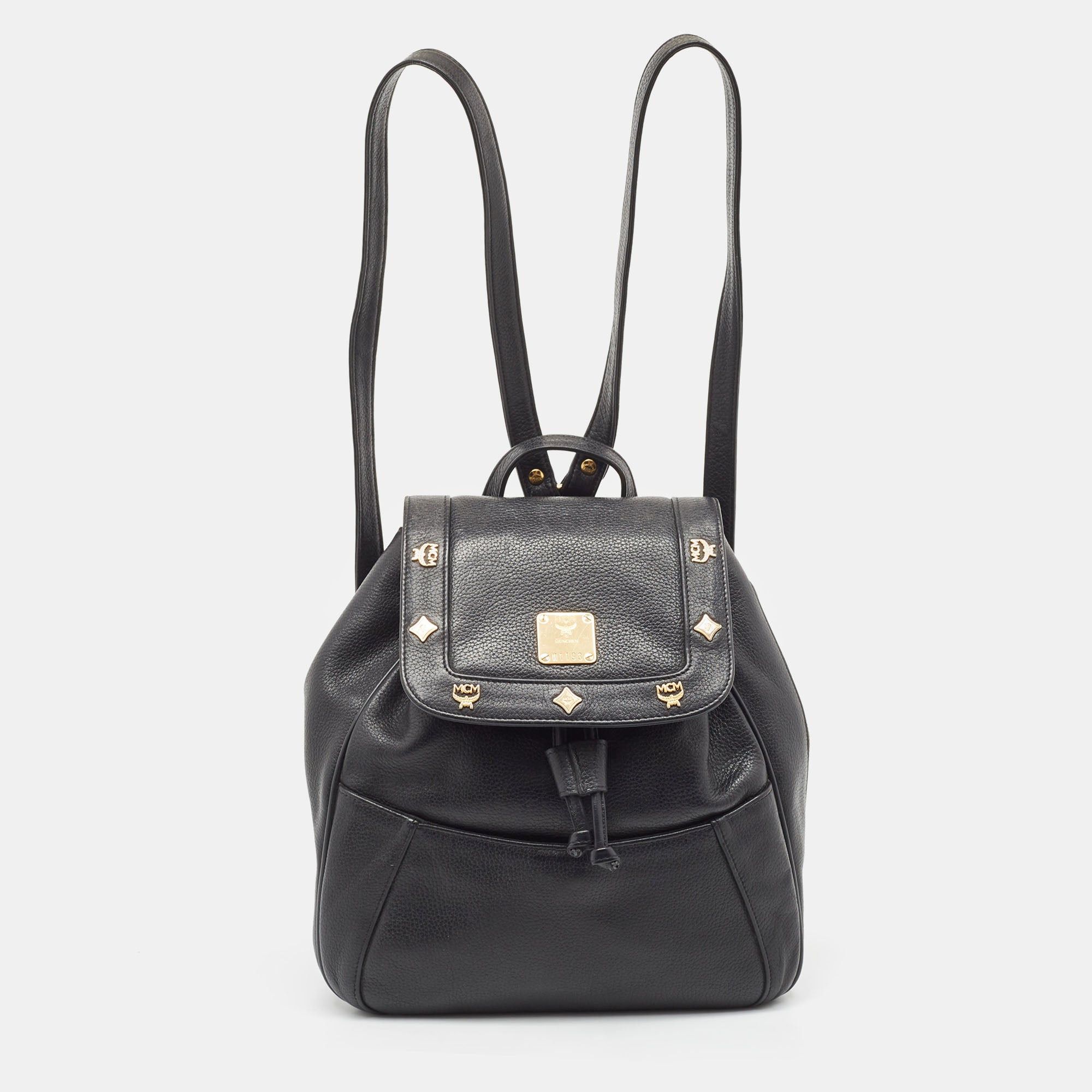 image of MCM Black Leather Studded Flap Backpack, Women's