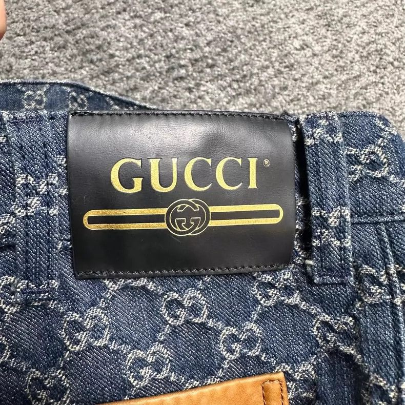 Gucci Double G full-print denim trousers