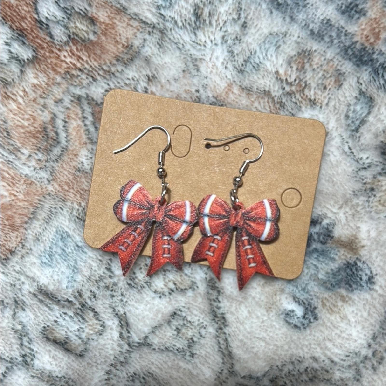 Designer Festive Football Bow Dangle Earrings Size ONE SIZE - 1 Thumbnail