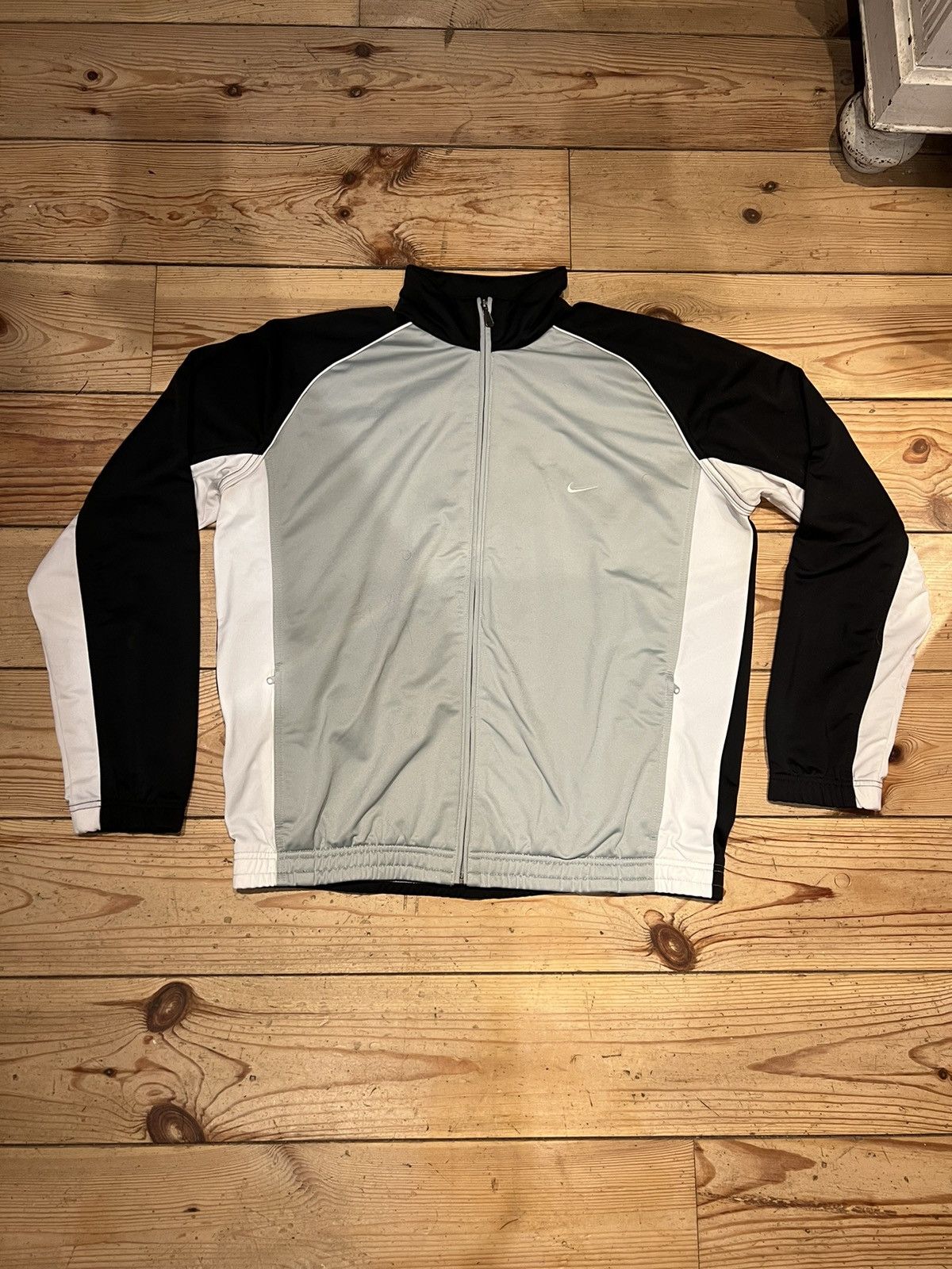 Vintage Nike zip through small swoosh jacket