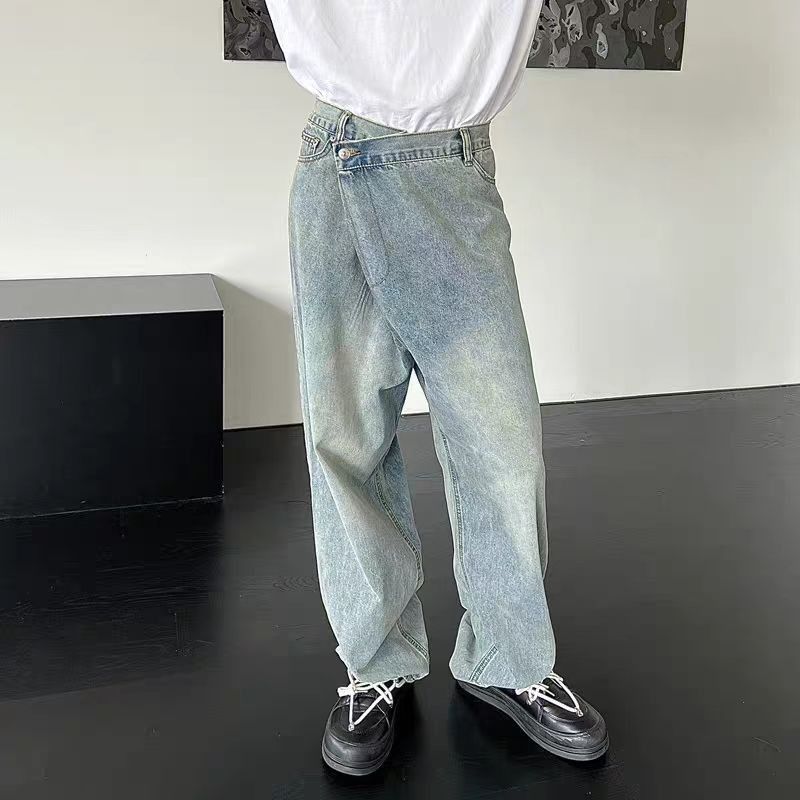 Slanted button design washed and worn straight jeans