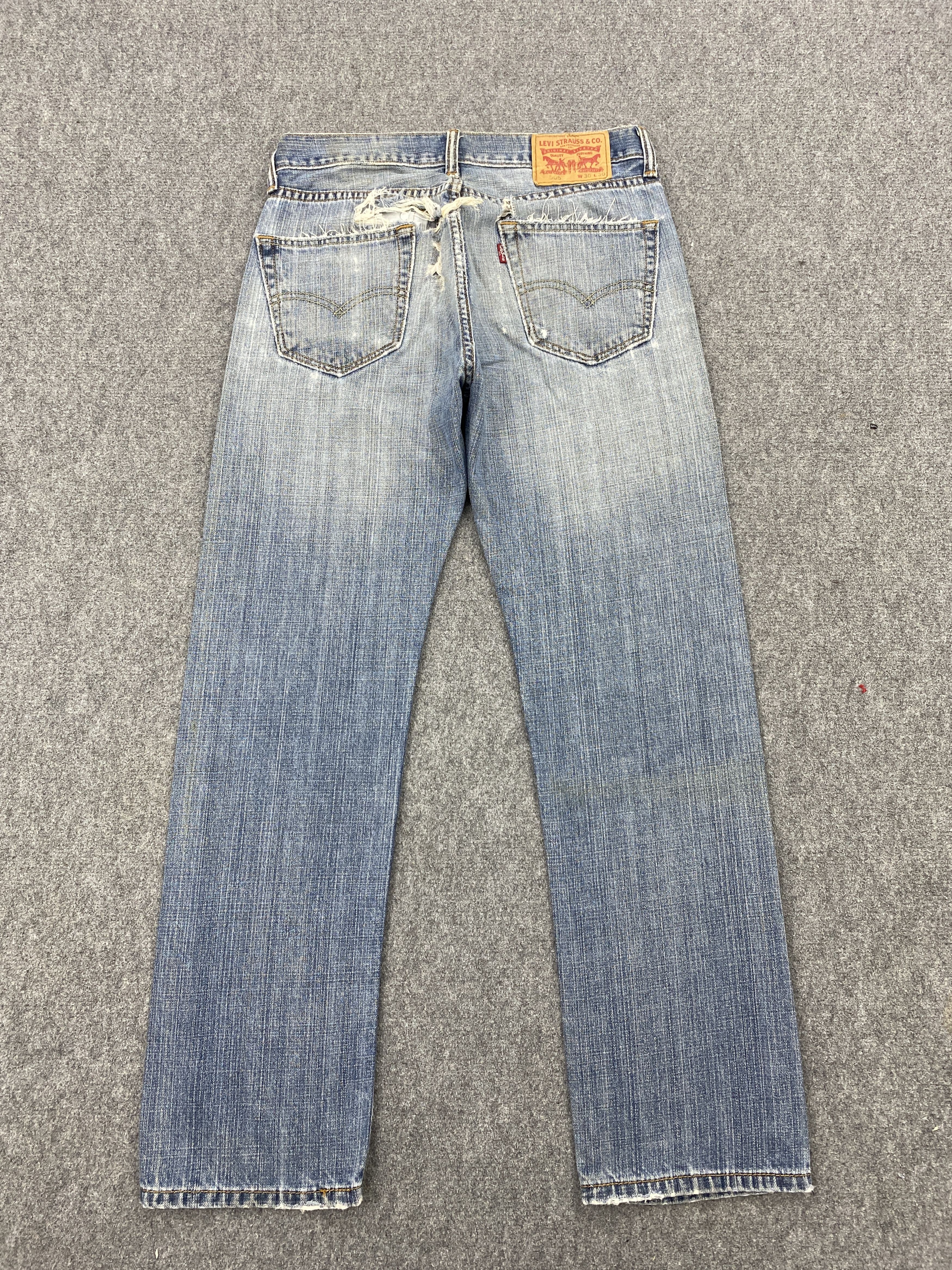 Distressed Vintage Levi's 505 Faded Blue Jeans