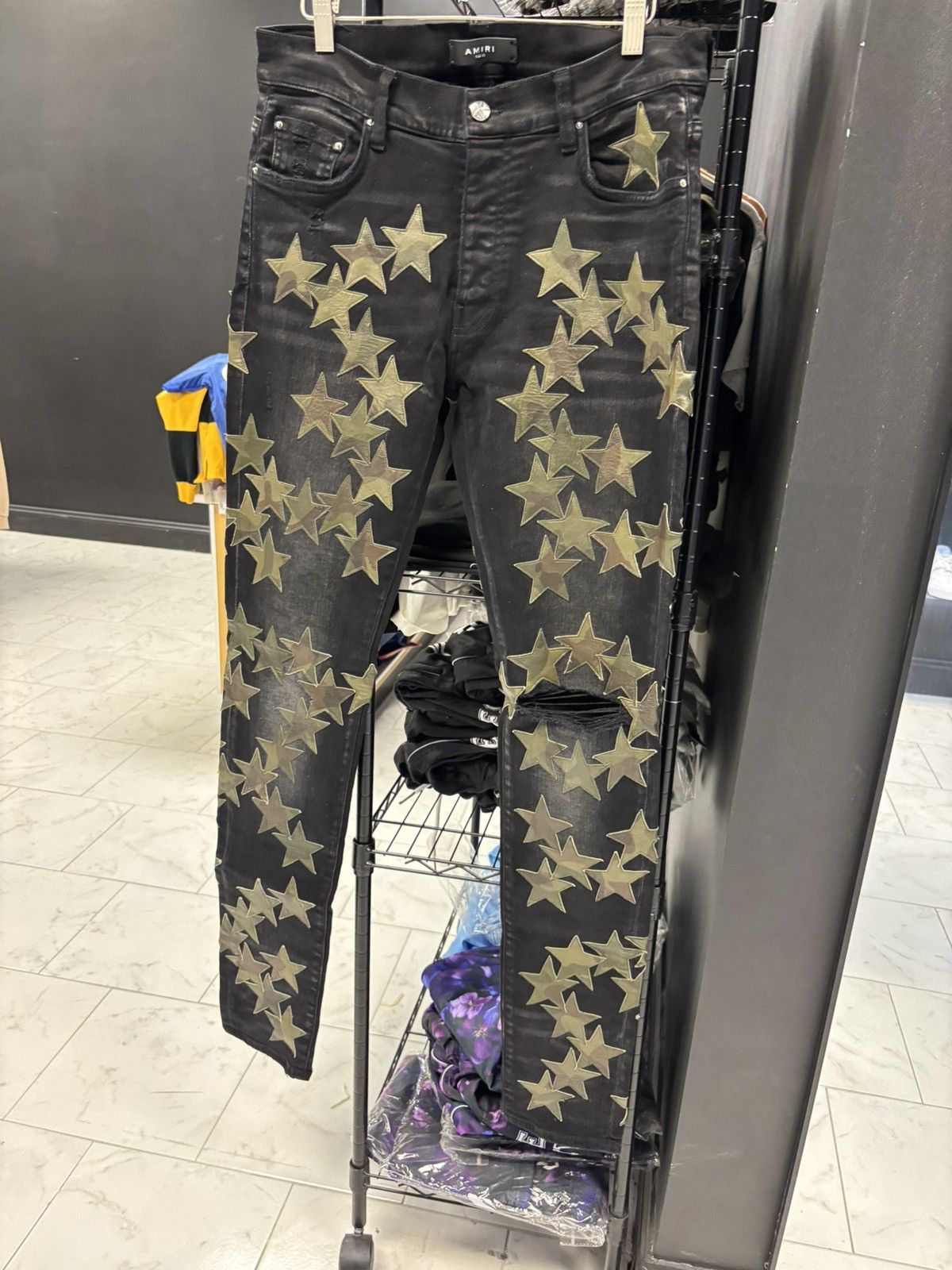 Amiri black camo chemist star patch jeans