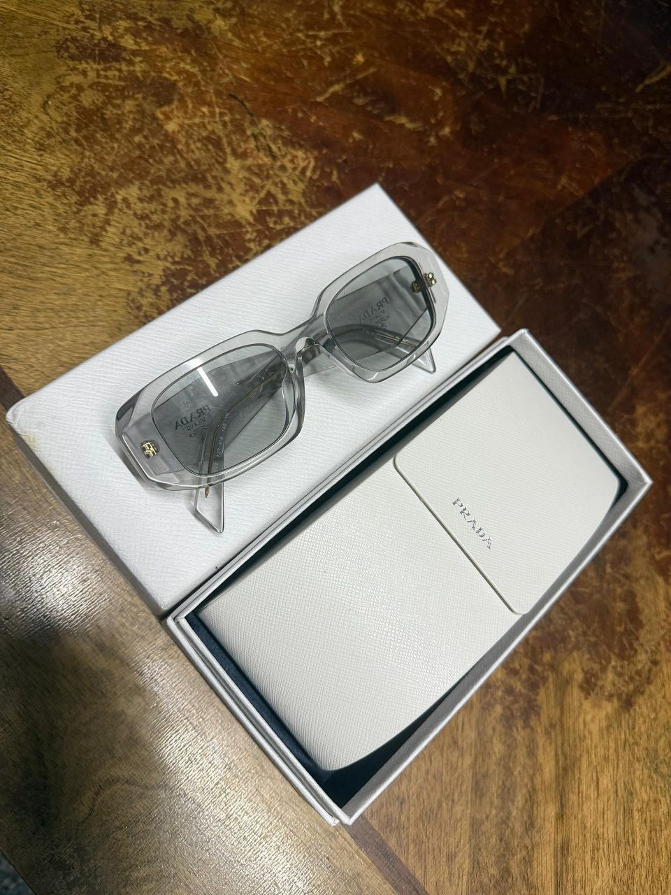 Prada Prada Rectangle Sunglasses Transparent Grey Size ONE SIZE - 1 Thumbnail
