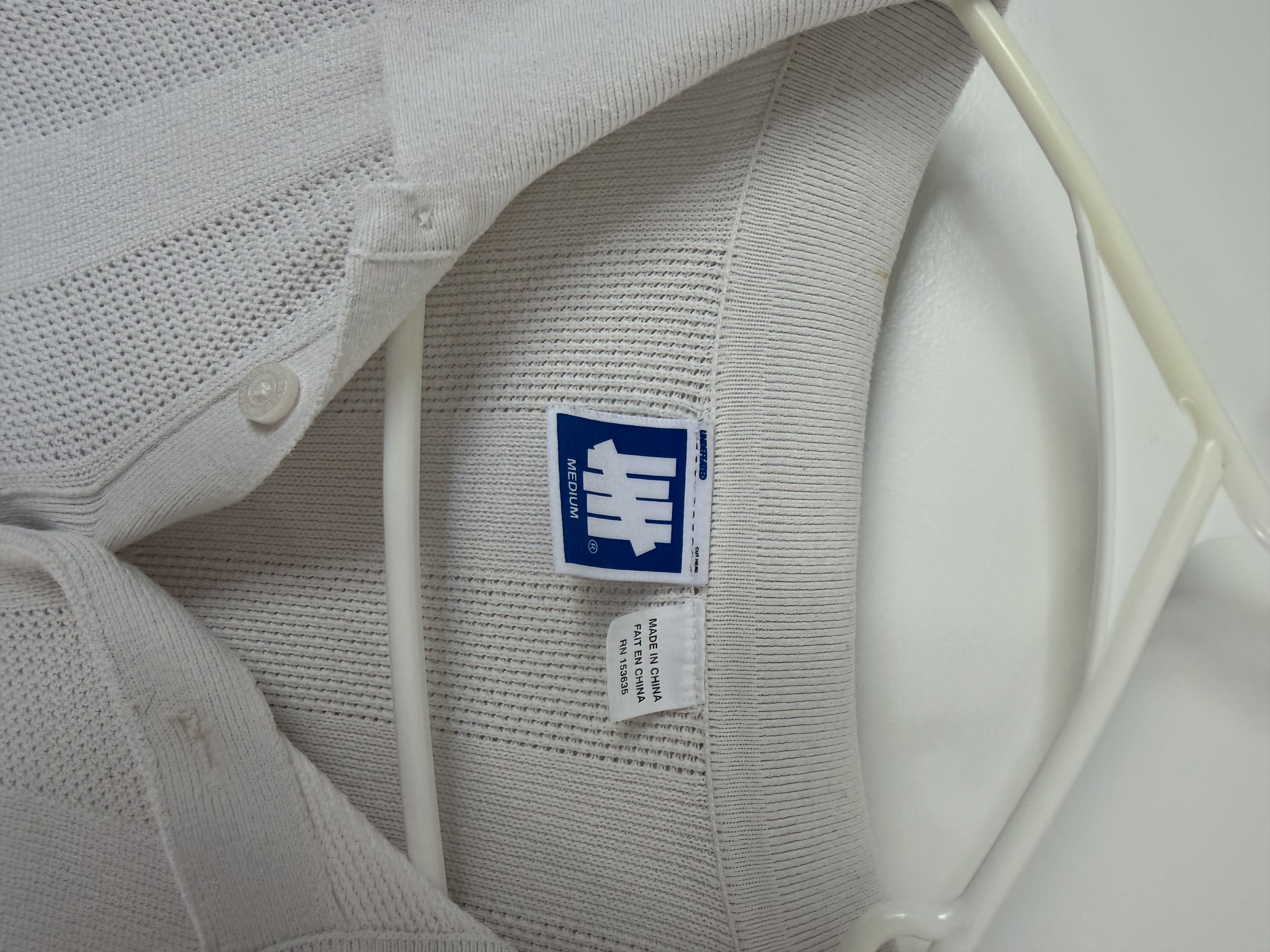 Undefeated Undefeated Polo Shirt – Minimal Streetwear Logo Polo Size US M / EU 48-50 / 2 - 4 Thumbnail