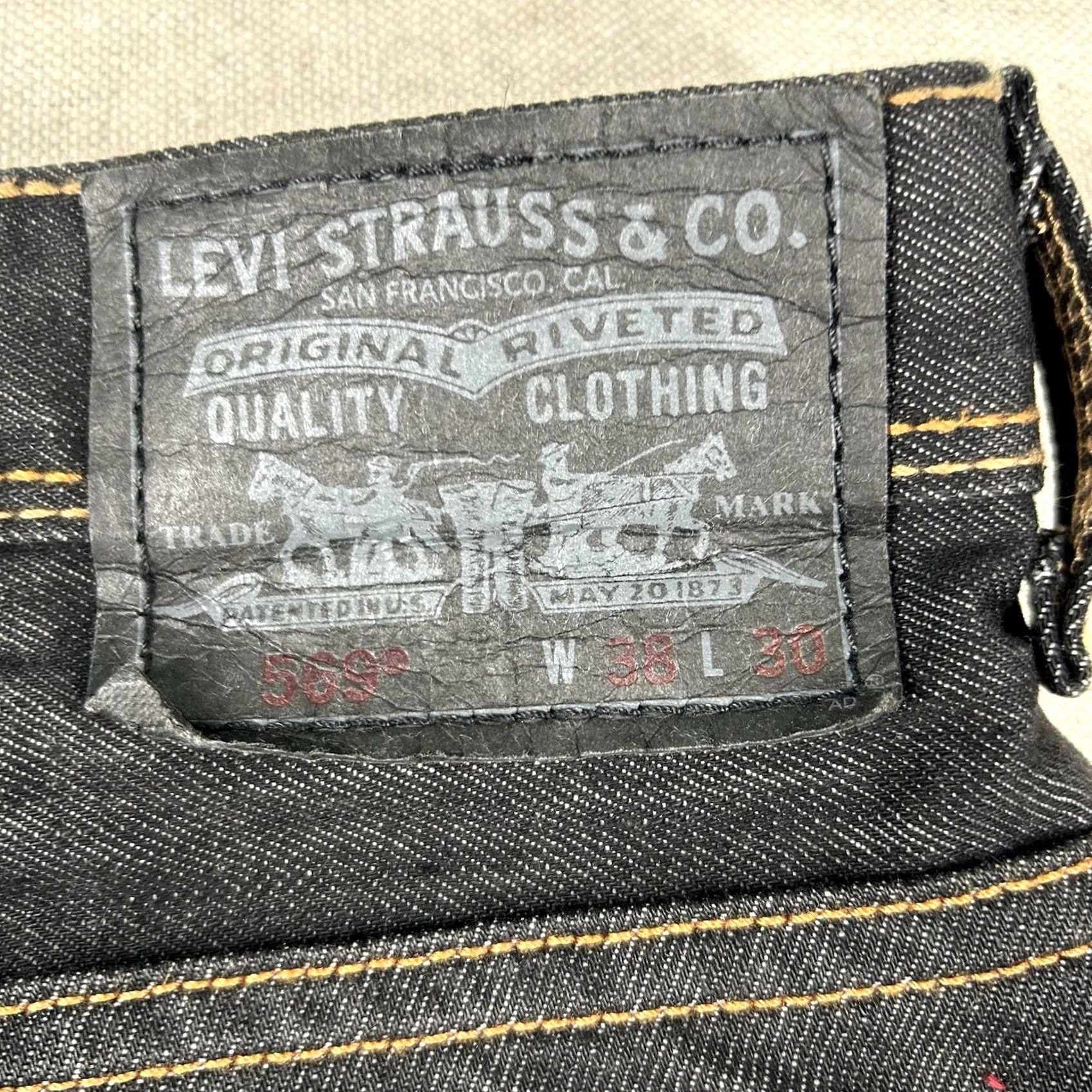 Levi's VINTAGE Levi's 569 Jeans Mens 38x30 Boot Cut Dark Wash Denim Classic Blue 5-Pocket Mens jeans measurements 31 inseam 42 waist 2000s style Boys? Size US 38 / EU 54 - 7 Thumbnail