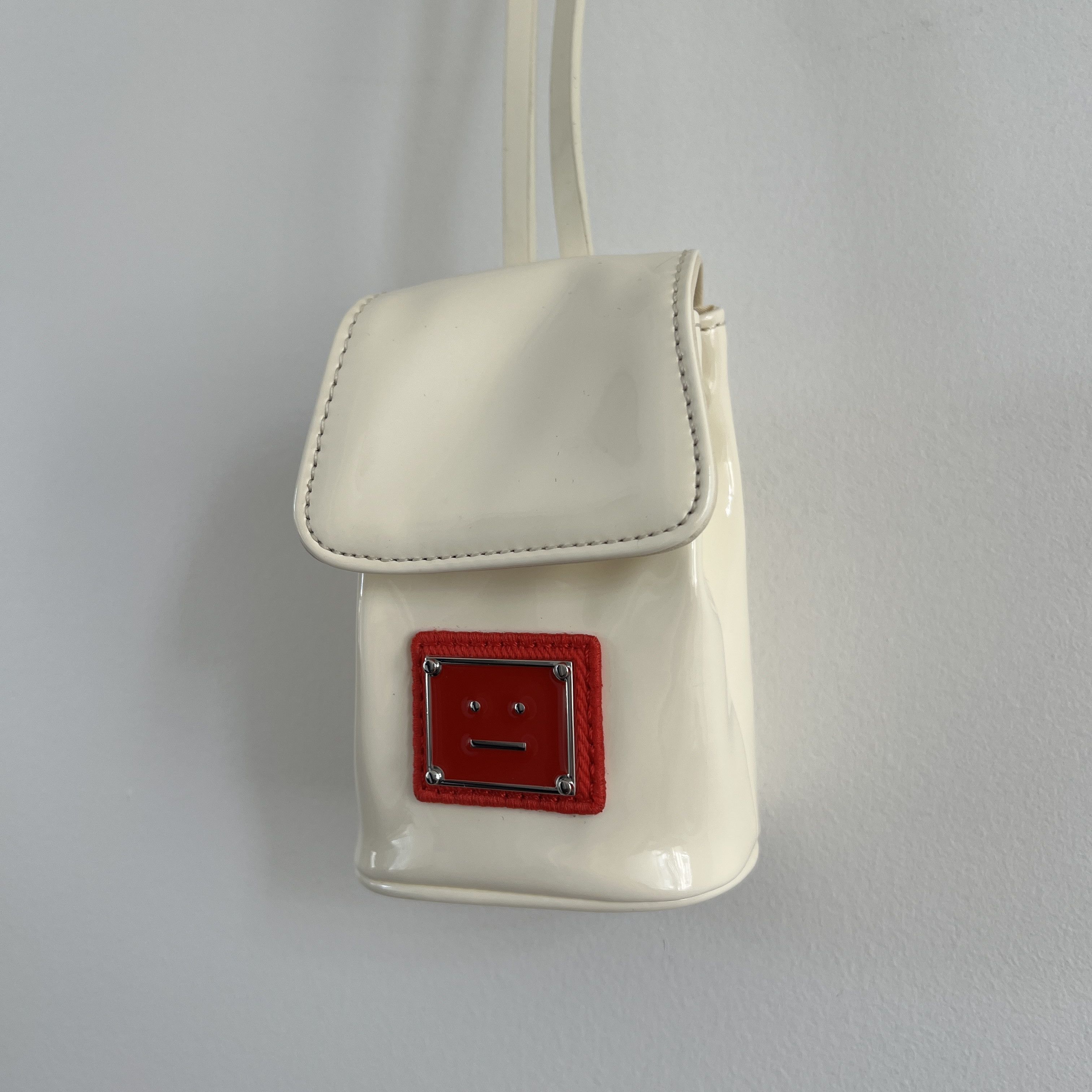 Acne Studios Asma Face Patent Leather Pouch Necklace (Cream) Size ONE SIZE - 1 Thumbnail