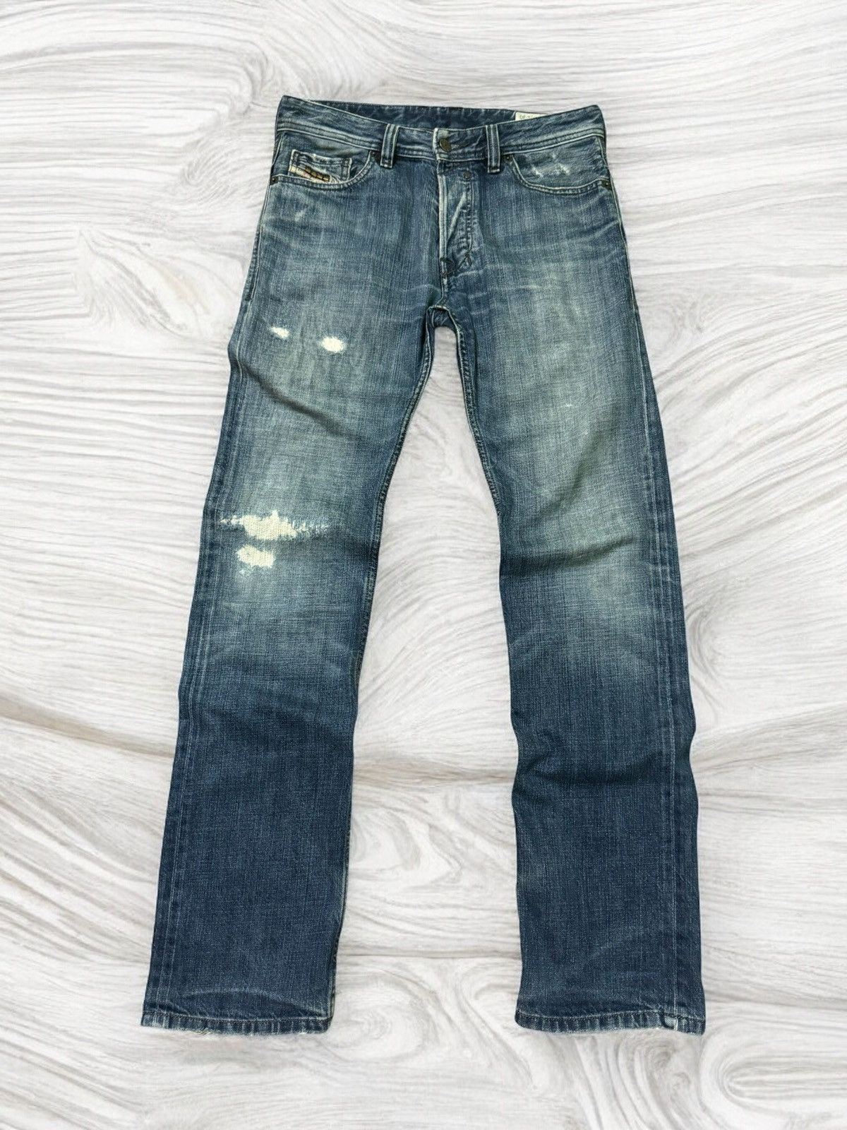 DIESEL INDUSTRY SNAP BUTTON DISTRESSED DENIM JEANS