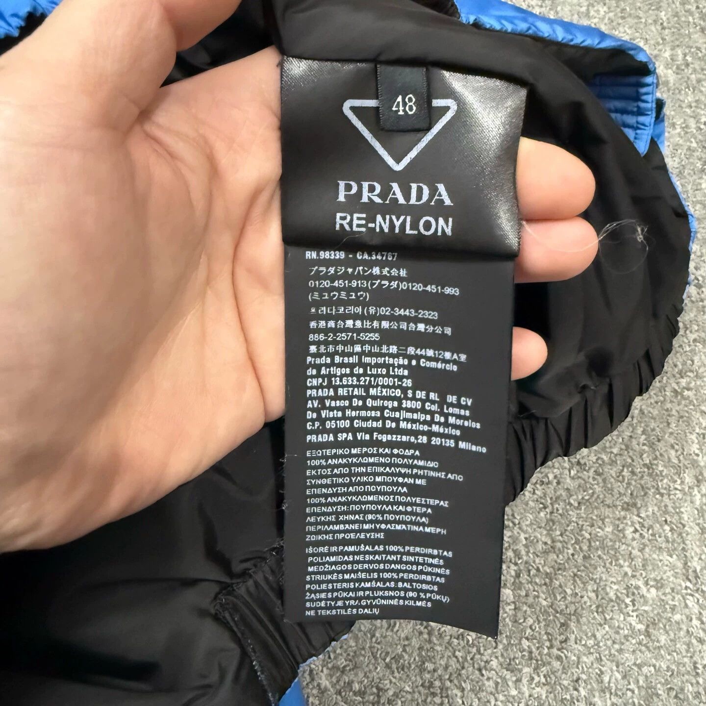 Prada Prada black blue colorblocked triangle logo puffer 48 99 new Size US M / EU 48-50 / 2 - 4 Thumbnail