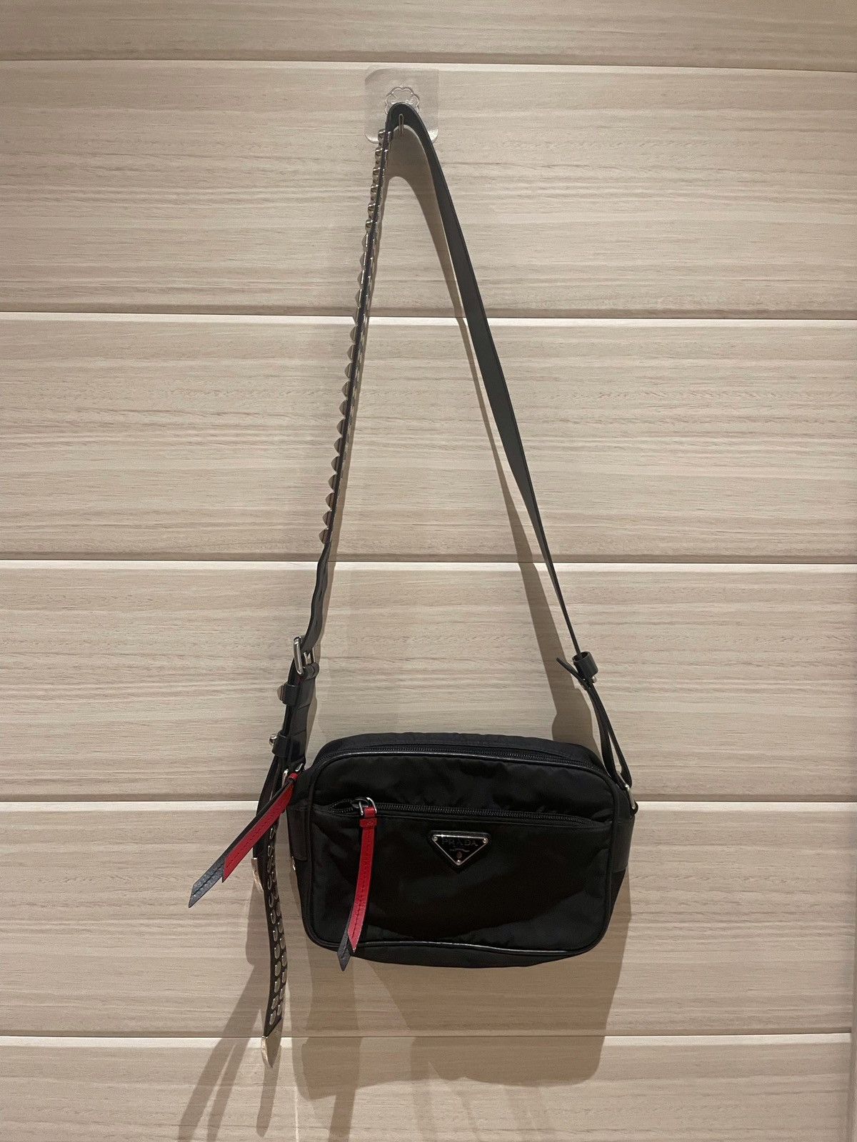 image of Prada Vela Studded Side Bags in Black, Men's