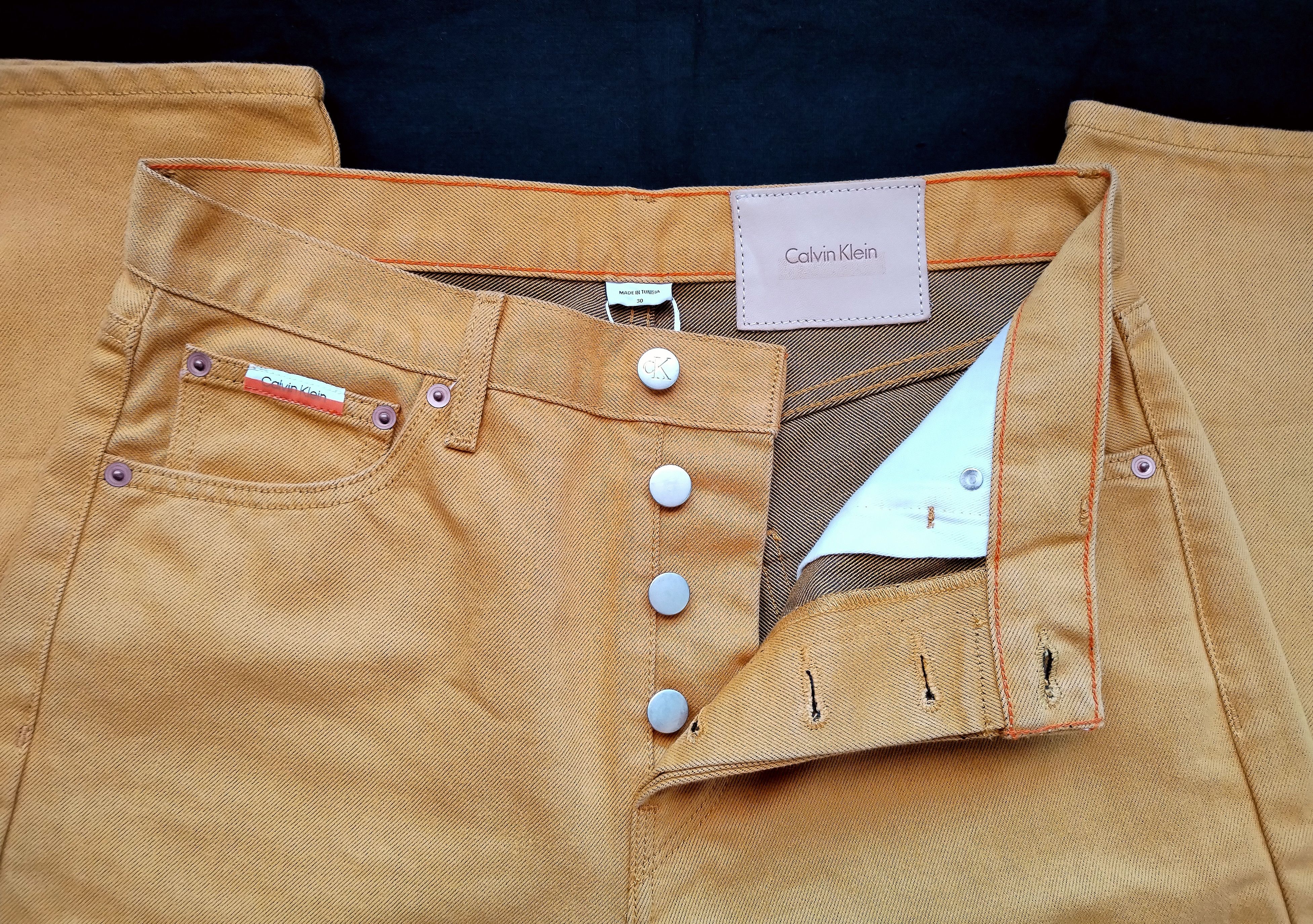 Calvin Klein × Heron Preston Rusty yellow jeans Size US 30 / EU 46 - 9 Thumbnail