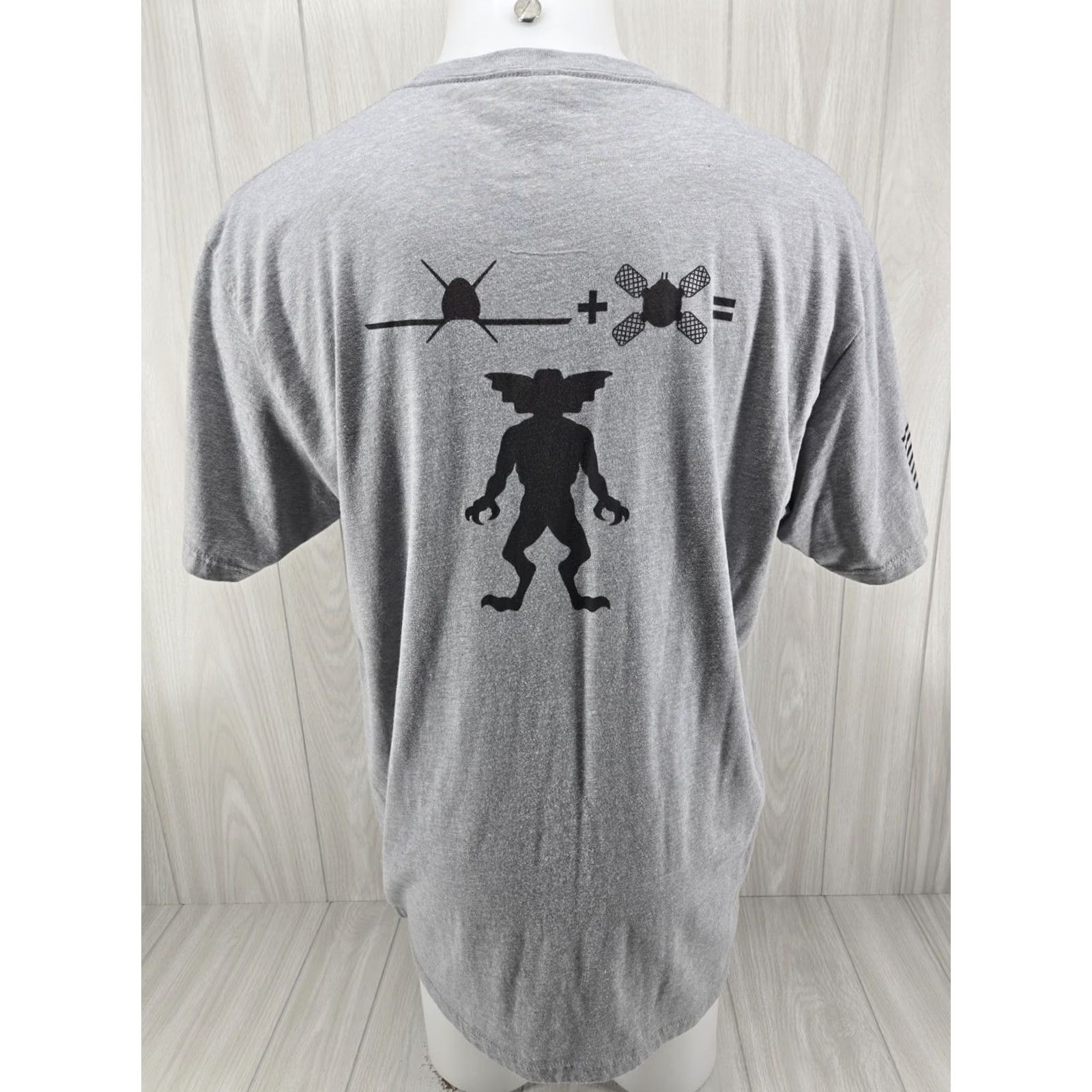 Next Level STAIN Dynetics Company X-61A Gremlins Men's Gray T-shirt Size 2XL Size US XXL / EU 58 / 5 - 2 Thumbnail