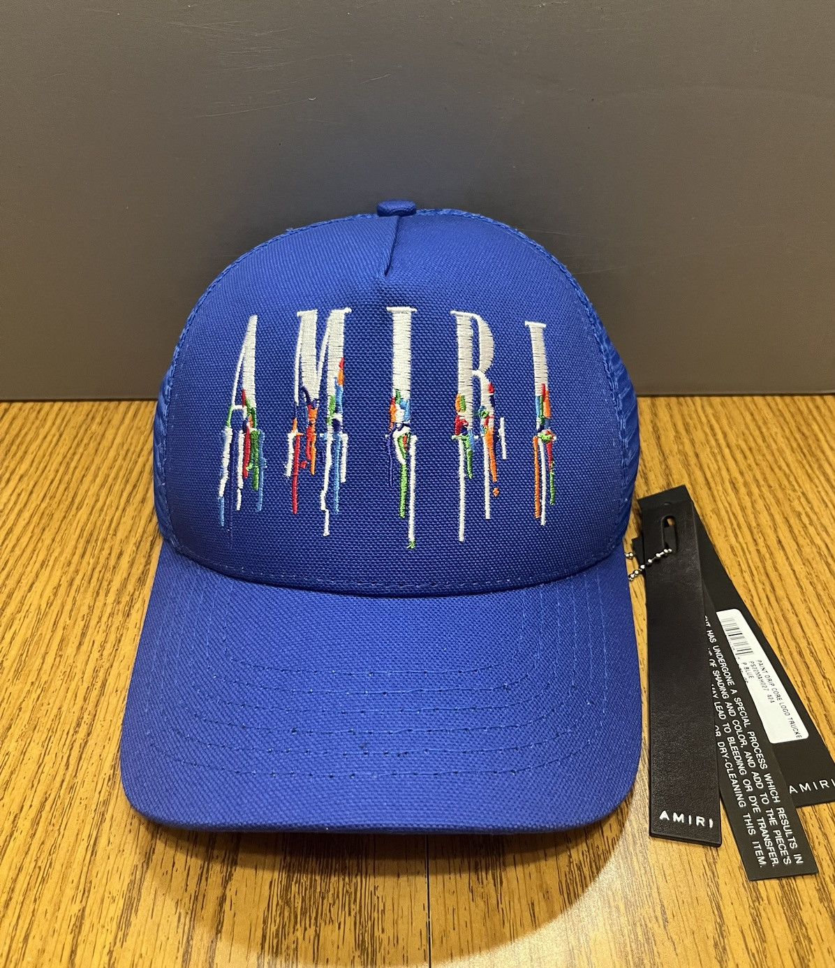 image of Amiri Paint Drip Core Logo Trucker Hat in Blue, Men's