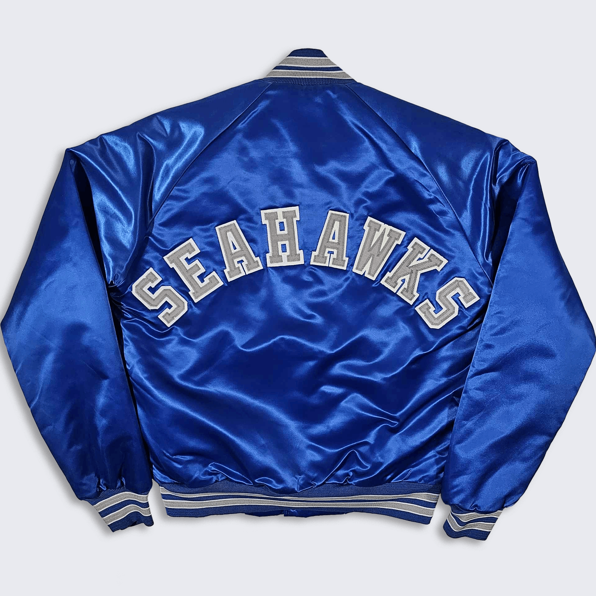 image of Seattle Seahawks Vintage 80's Chalk Line Satin Bomber Jacket in Blue/Silver, Men's (Size Small)