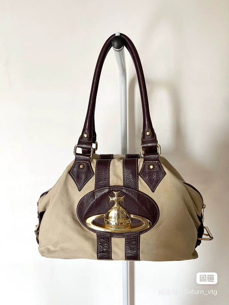 Vivienne Westwood Vivienne Westwood size os Mip color scheme, golden Saturn o Size ONE SIZE - 1 Thumbnail