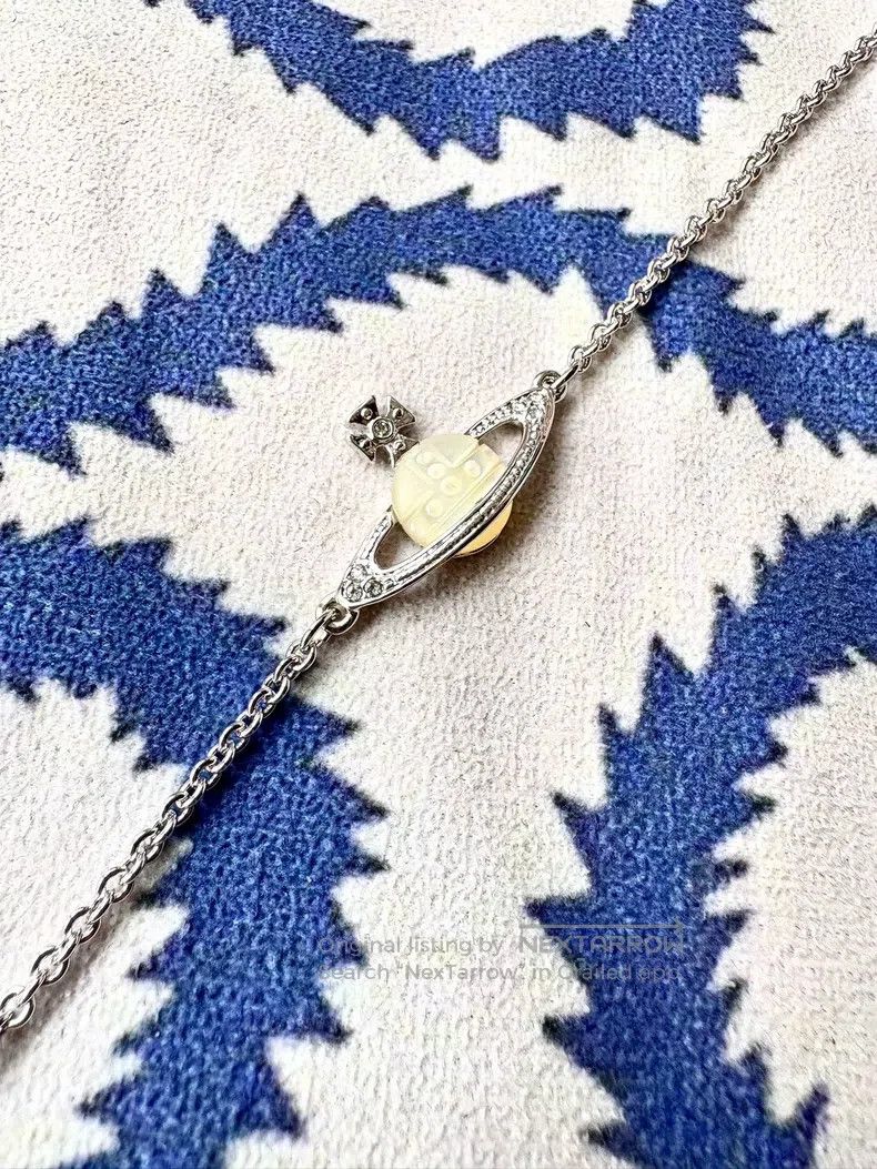 Vivienne Westwood Vivienne Westwood White Mother-of-pearl Saturn Bracelet Size ONE SIZE - 1 Thumbnail