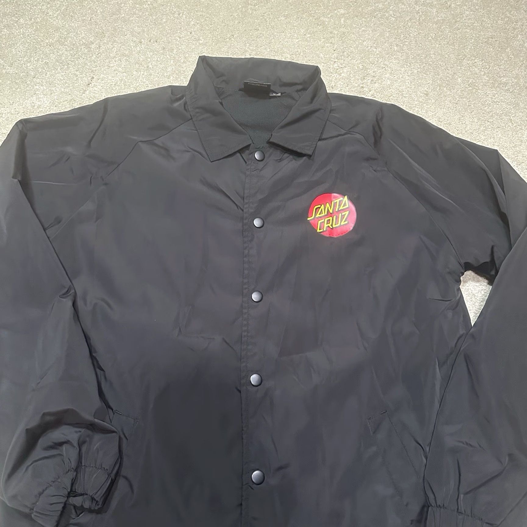 Vintage Santa Cruz Jacket Mens Medium Black Windbreaker All Seasons 80s 90s Logo Regular Short Solid Polyester Lining Zip Coat Weather windbreaker Size US M / EU 48-50 / 2 - 3 Thumbnail