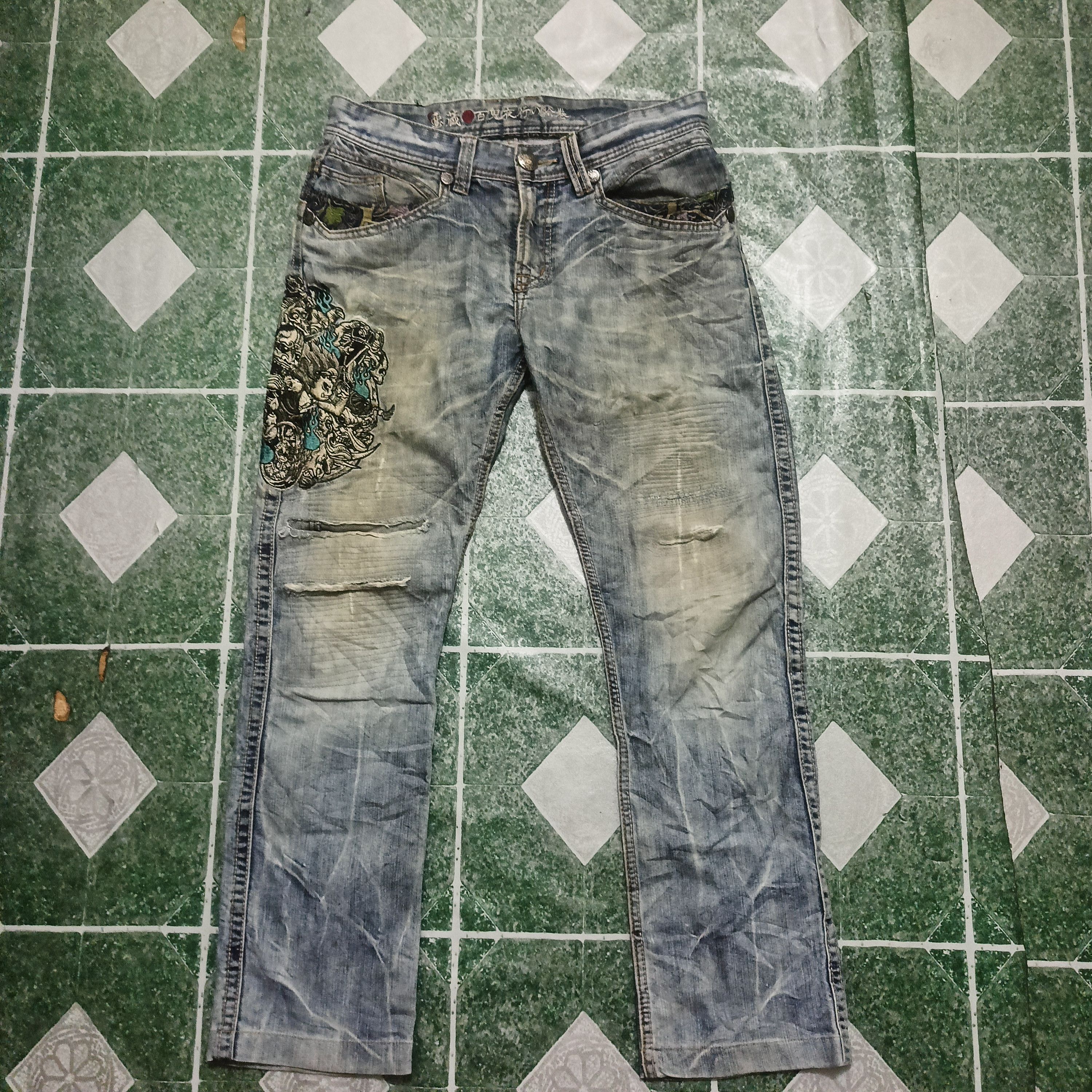 image of Avant Garde x Distressed Denim Jizo Bosatsu Distressed Thrashed Embroidery Logo Jeans Denim in Fade