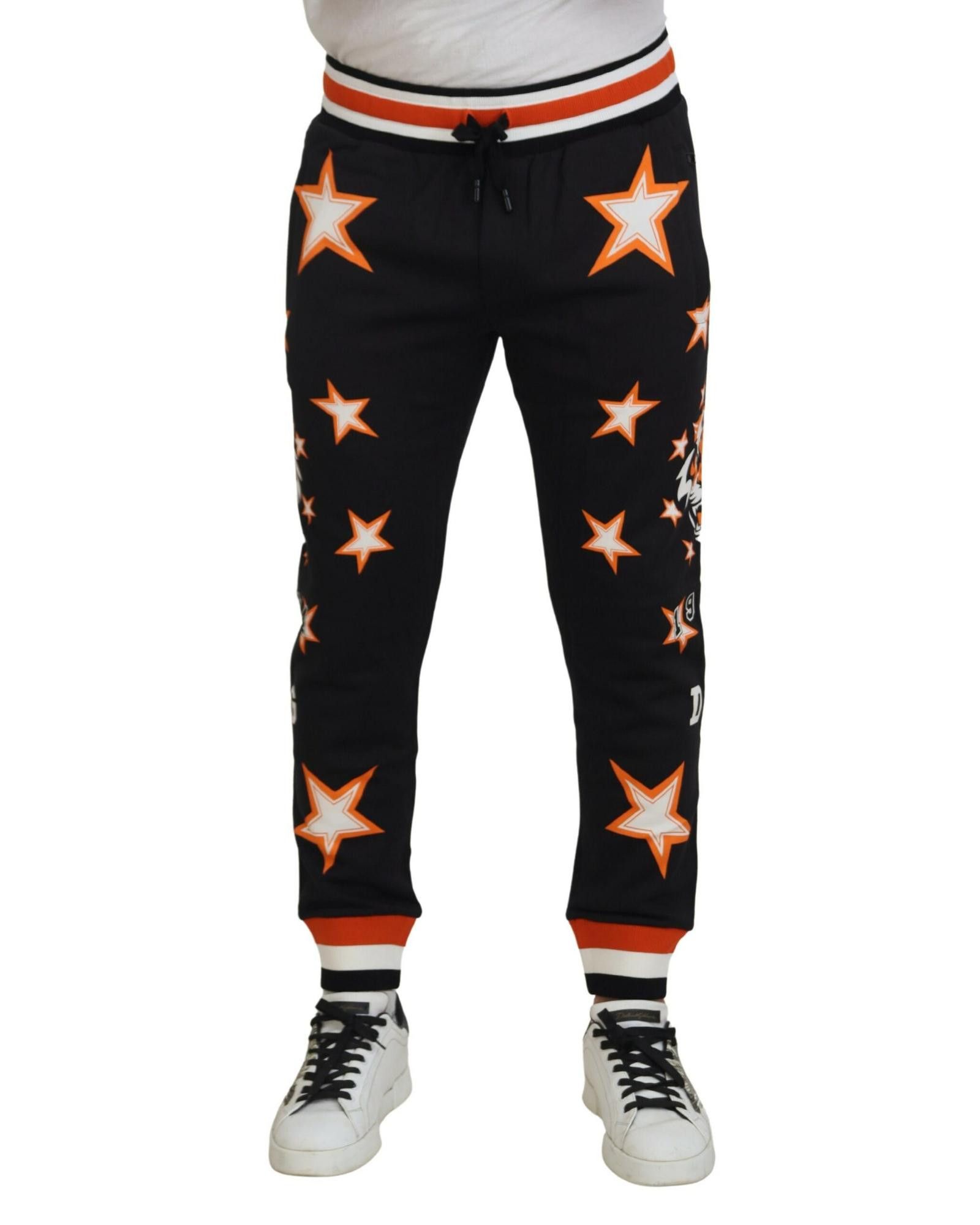 image of Dolce Gabbana Orange Star Sweatpants in Black, Men's (Size 30)