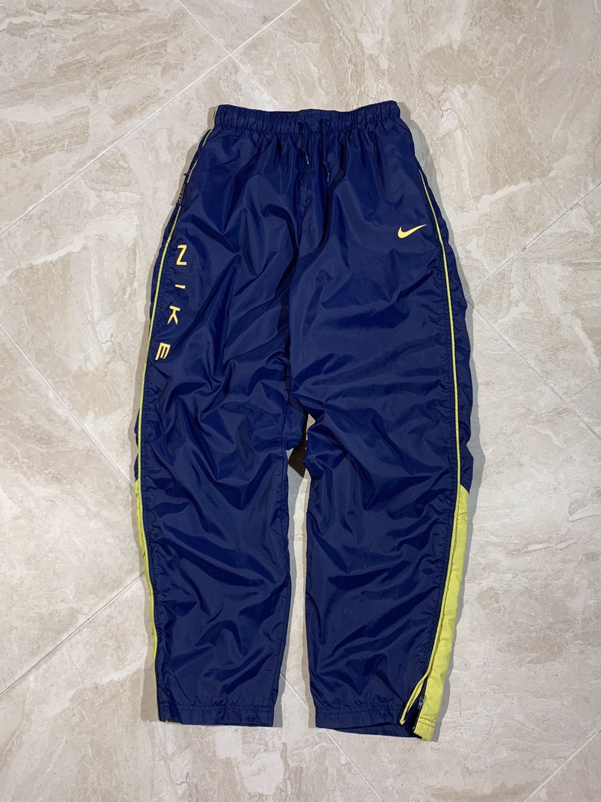 Nike Y2K VTG 2000s Nike full snap button nylon track pants faded