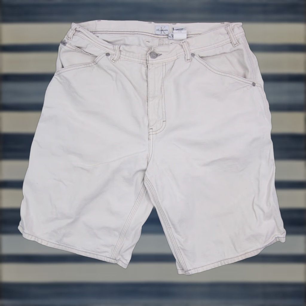 Calvin Klein VINTAGE Calvin Klein Mens Jean Shorts 33 Tan Y2k Patch 9/10 Shirts? Size US 33 - 1 Thumbnail