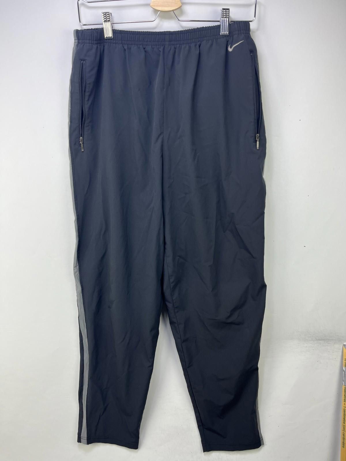 Nike Vintage Nike Windbreaker Baggy Track Pants Large Size US 34 / EU 50 - 1 Thumbnail