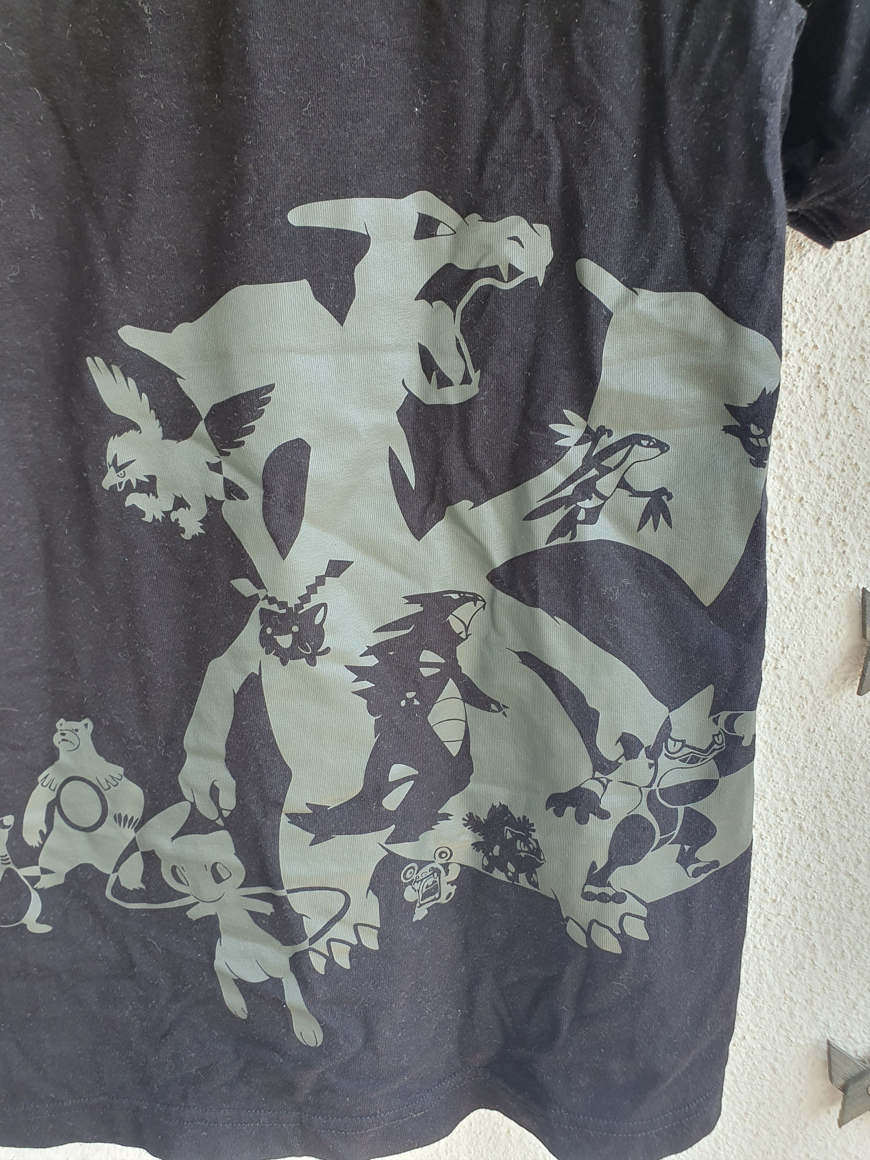 Pokemon × Uniqlo Uniqlo UTGP T-shirt Pikachu Charizard Pokemon GP 2019 L Size US L / EU 52-54 / 3 - 13 Thumbnail