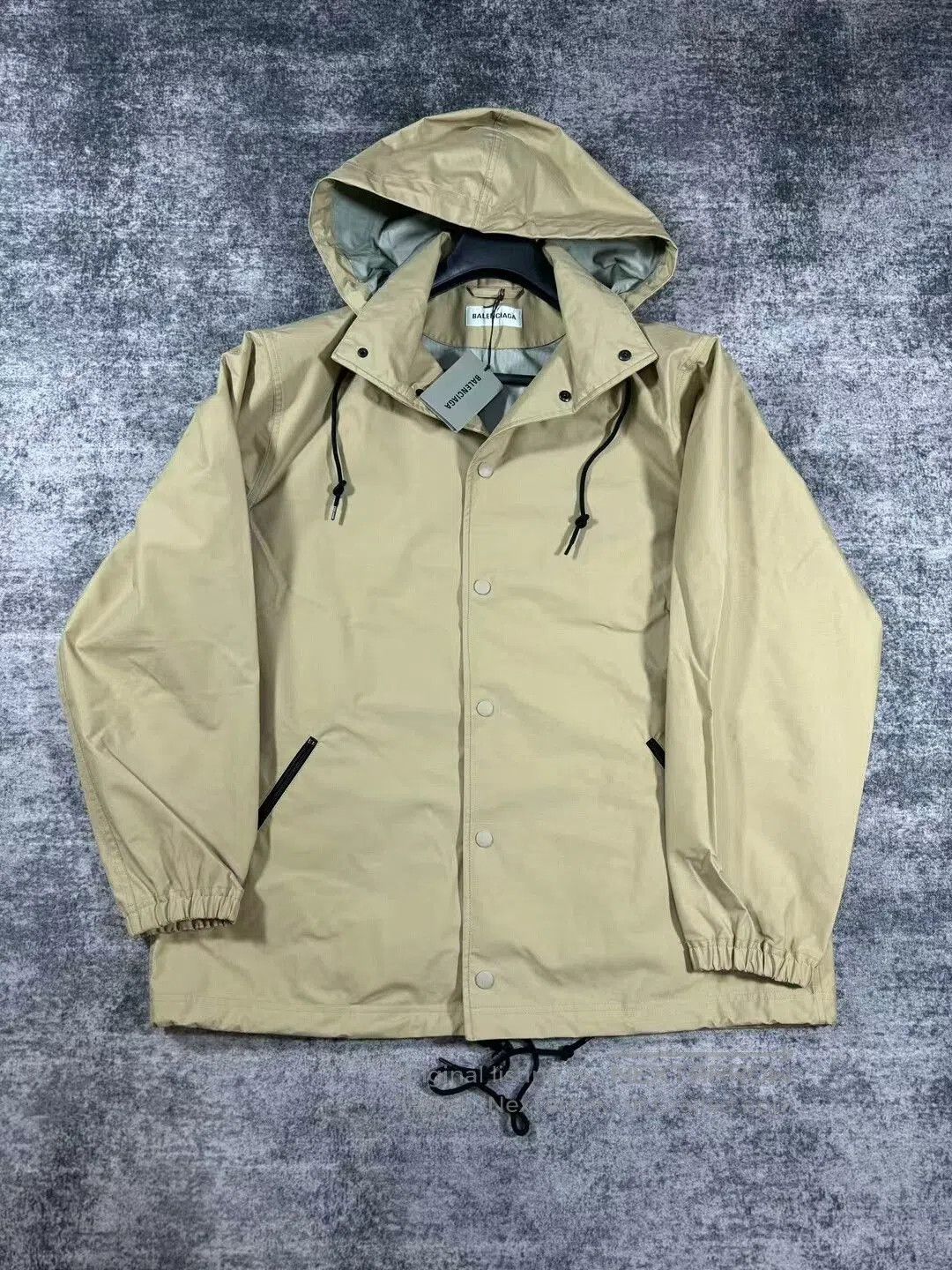 balenciaga khaki logo hooded jacket.