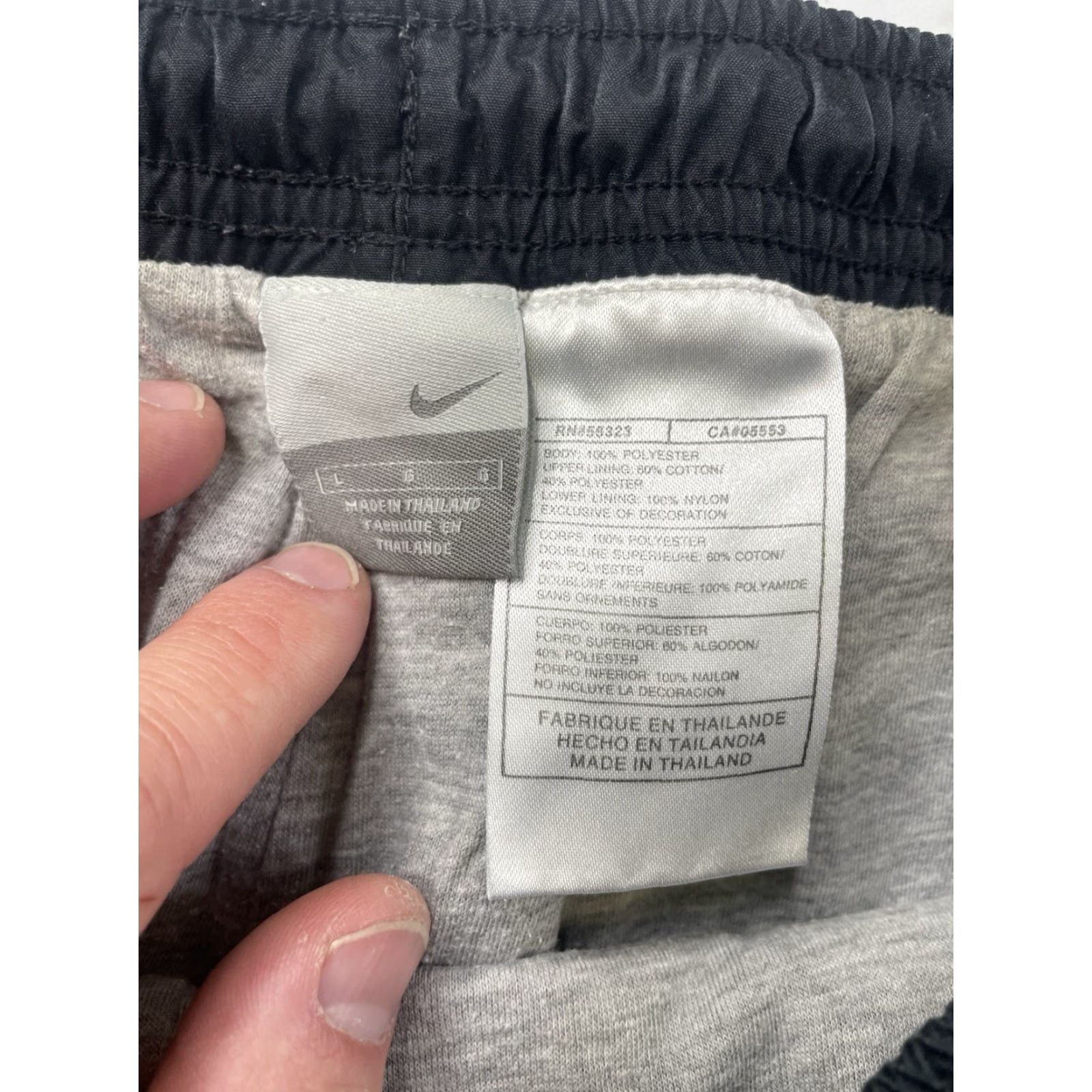 Nike VINTAGE Nike Track Pants Men L Track Pants Black Nylon Polyester Zip Striped Elastic Waist Lined Pockets Baggy Regular Straight Size US 33 - 6 Thumbnail