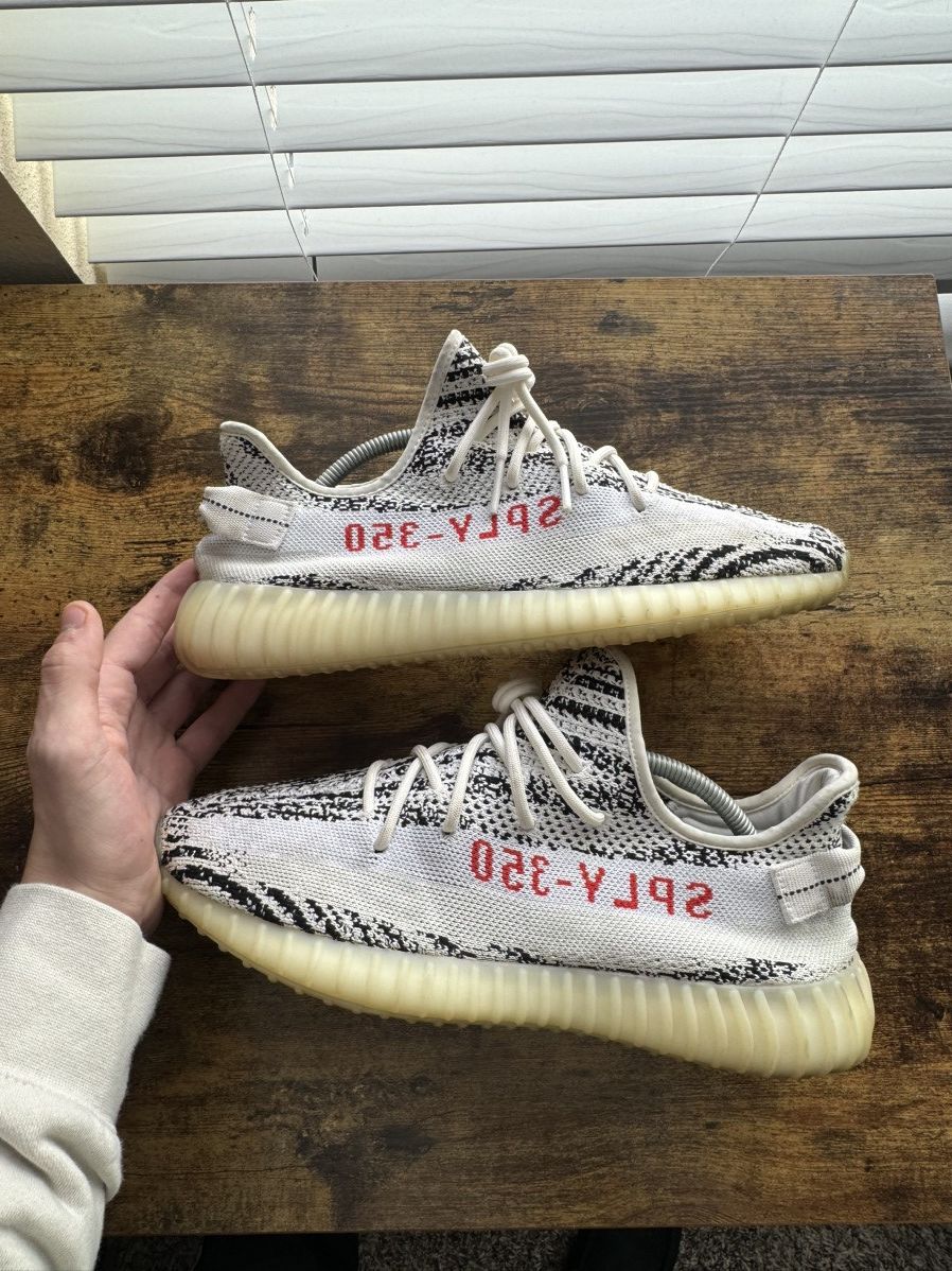 image of Yeezy Season 2019 Yeezy 350 V2 ‘Zebra’ Shoes in White, Men's (Size 11)